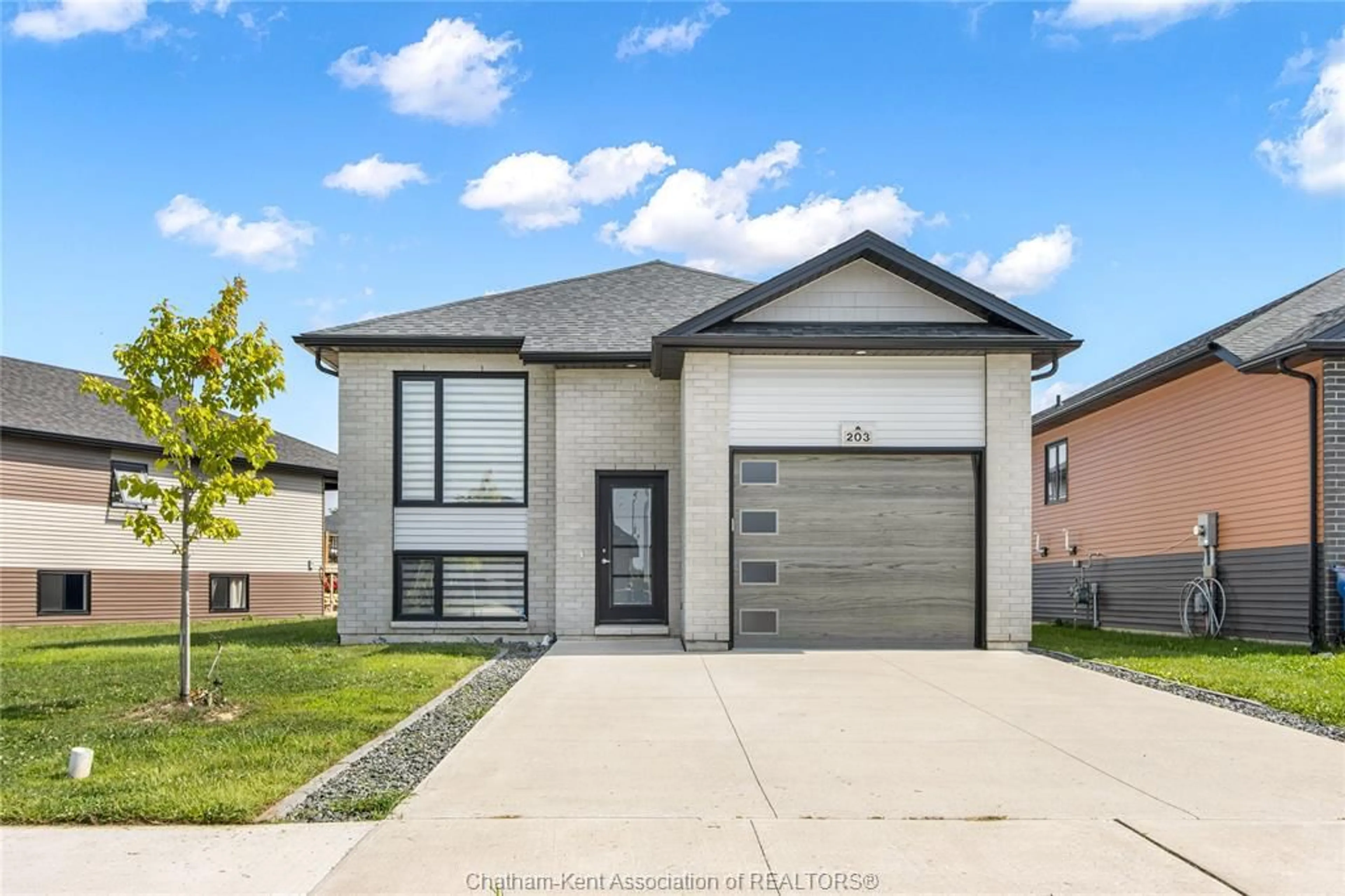 Home with brick exterior material, street for 203 MOONSTONE Cres, Chatham Ontario N7M 0S1
