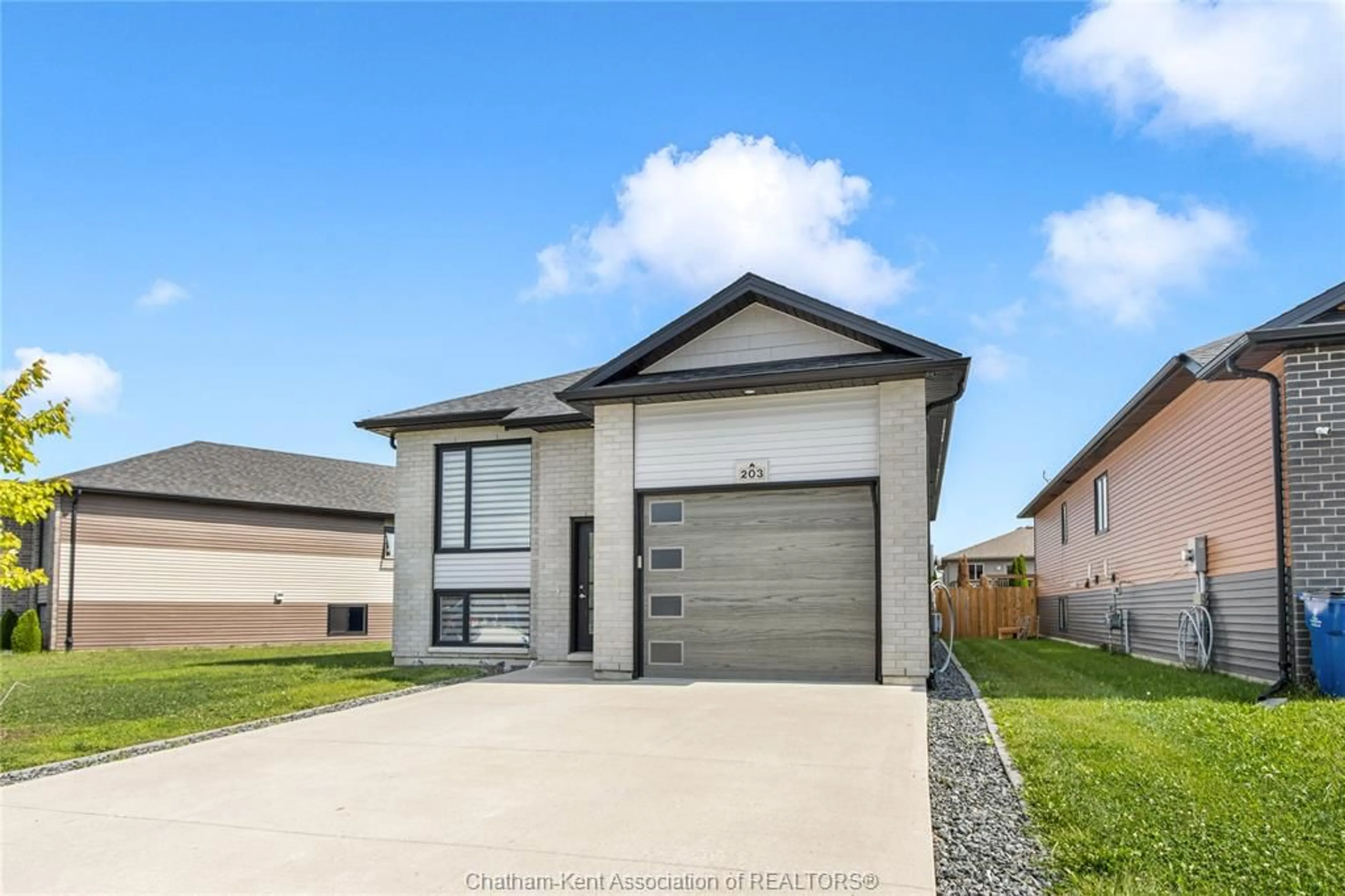 Home with brick exterior material, street for 203 MOONSTONE Cres, Chatham Ontario N7M 0S1