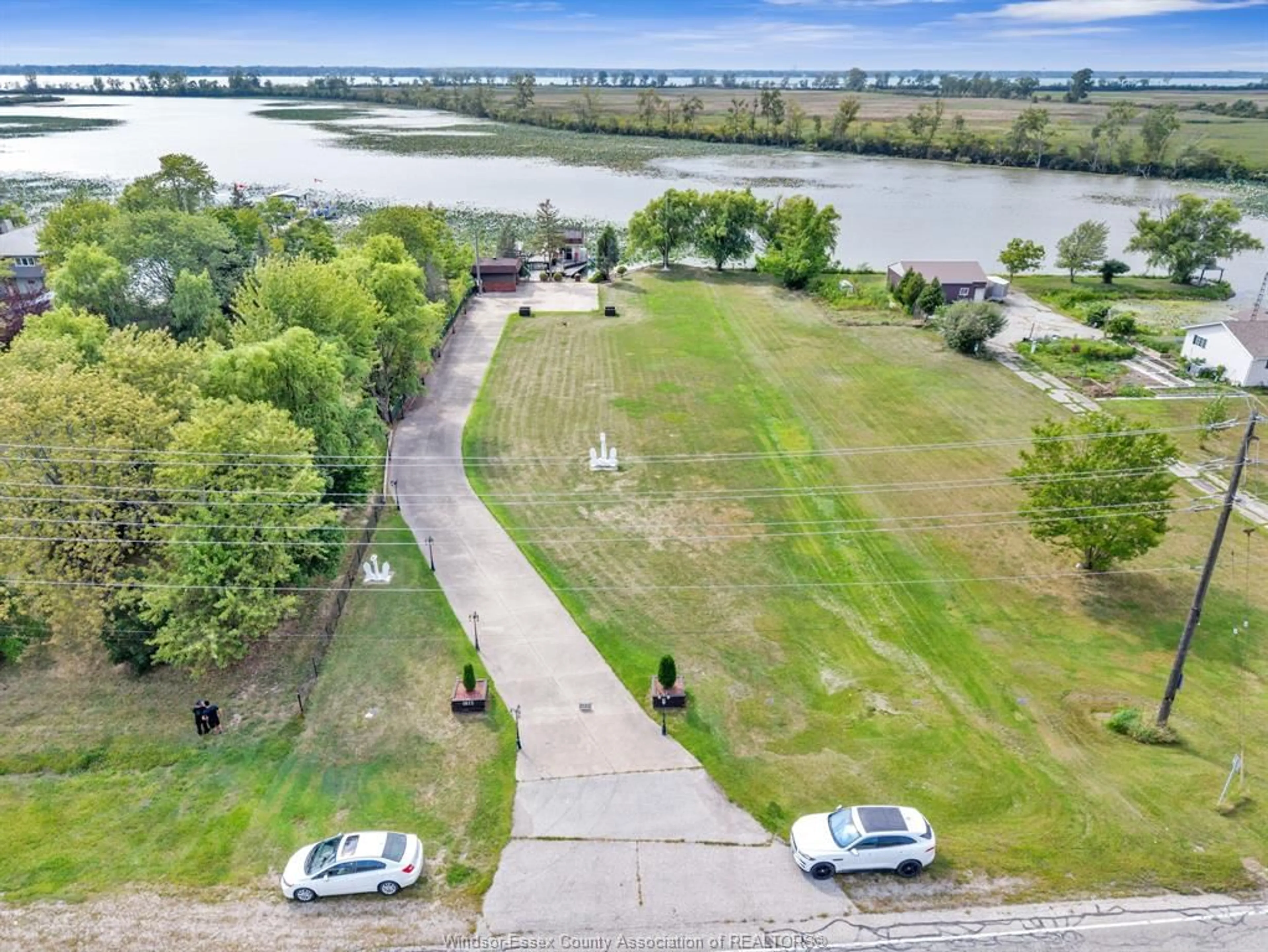 A pic from outside/outdoor area/front of a property/back of a property/a pic from drone, water/lake/river/ocean view for 1812 FRONT, Amherstburg Ontario N9V 3R3