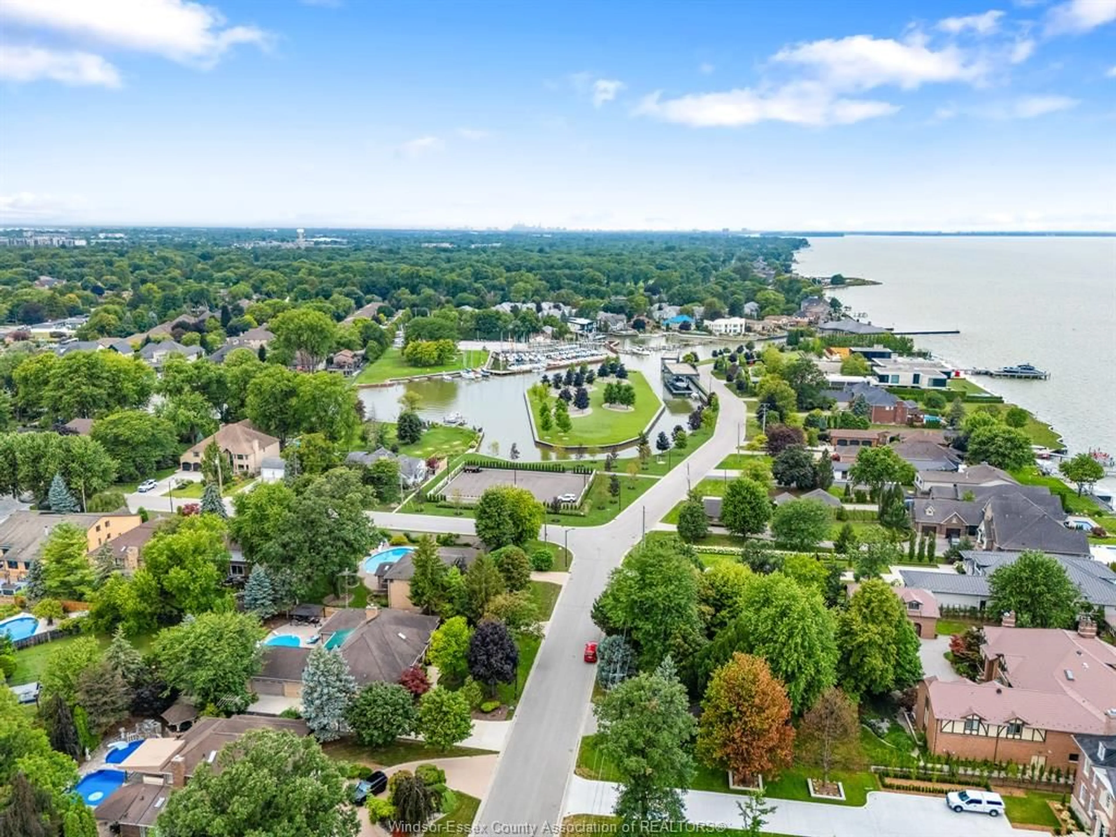 A pic from outside/outdoor area/front of a property/back of a property/a pic from drone, water/lake/river/ocean view for 267 ELMGROVE Dr, Lakeshore Ontario N8N 4G9