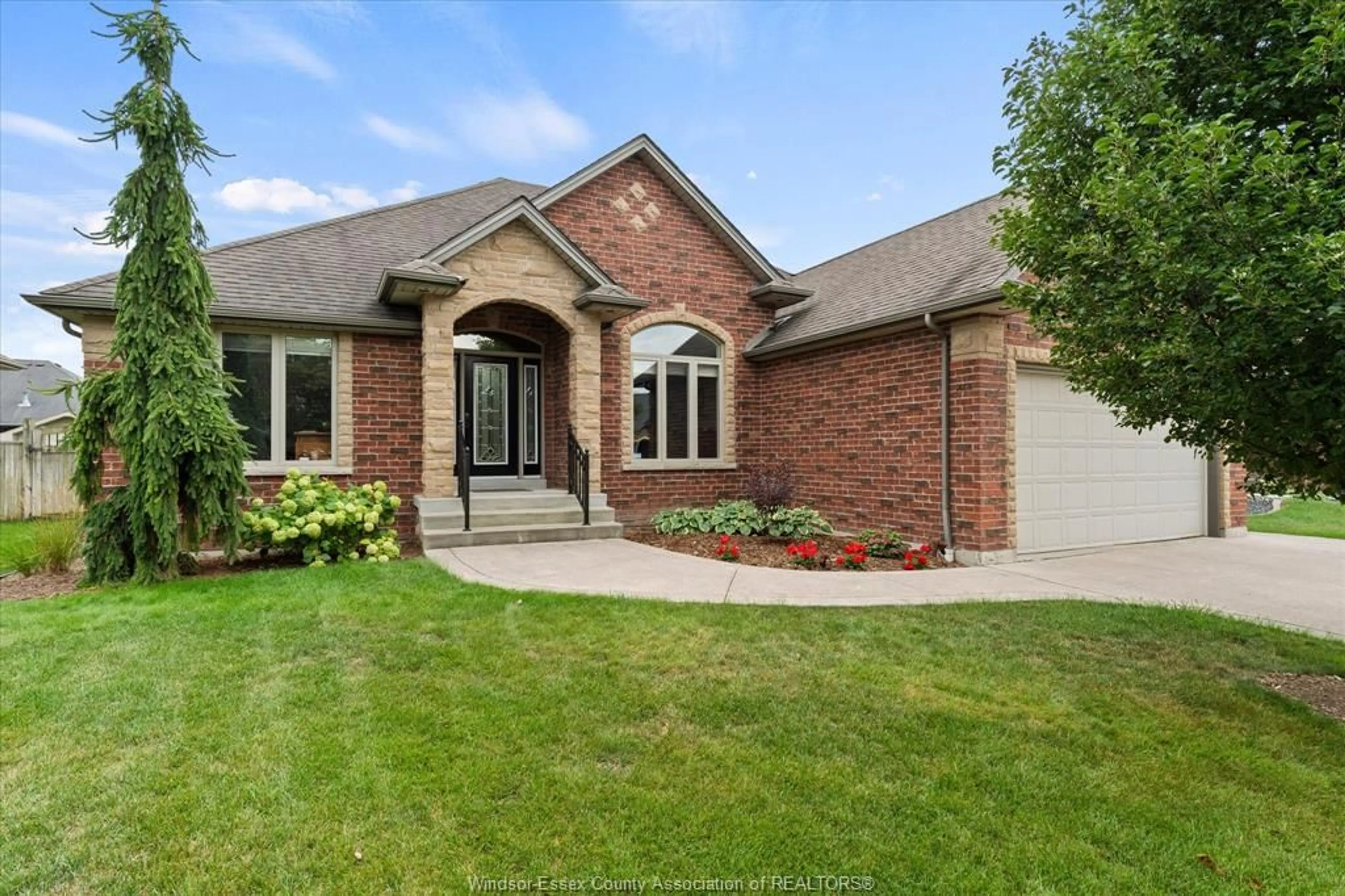 Home with brick exterior material, street for 1031 HUNTINGTON Blvd, Lakeshore Ontario N0R 1A0