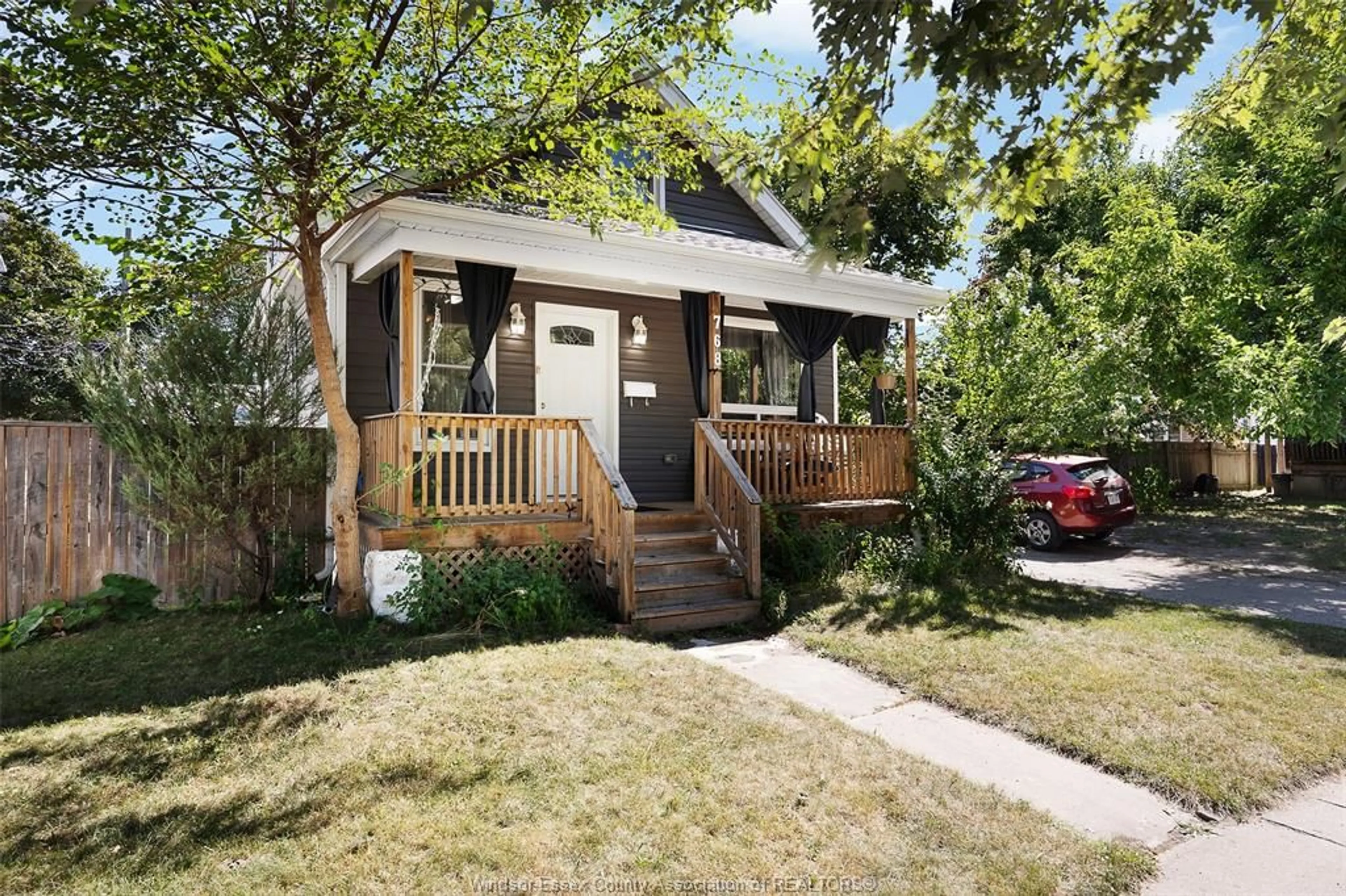 Home with vinyl exterior material, street for 768 MCKAY, Windsor Ontario N9B 2A1
