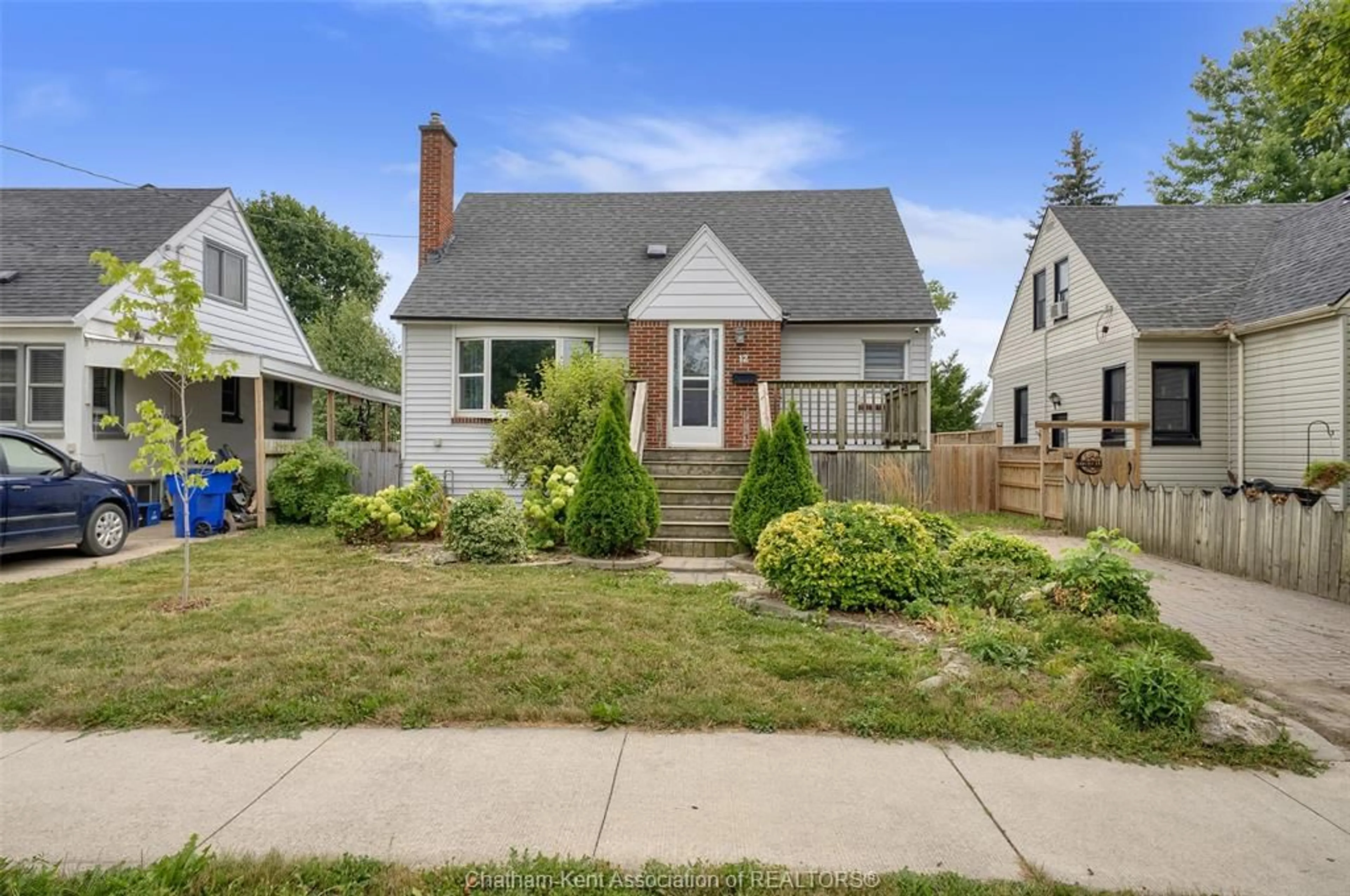 Home with vinyl exterior material, street for 12 McKinnon Dr, Chatham Ontario N7M 1B4