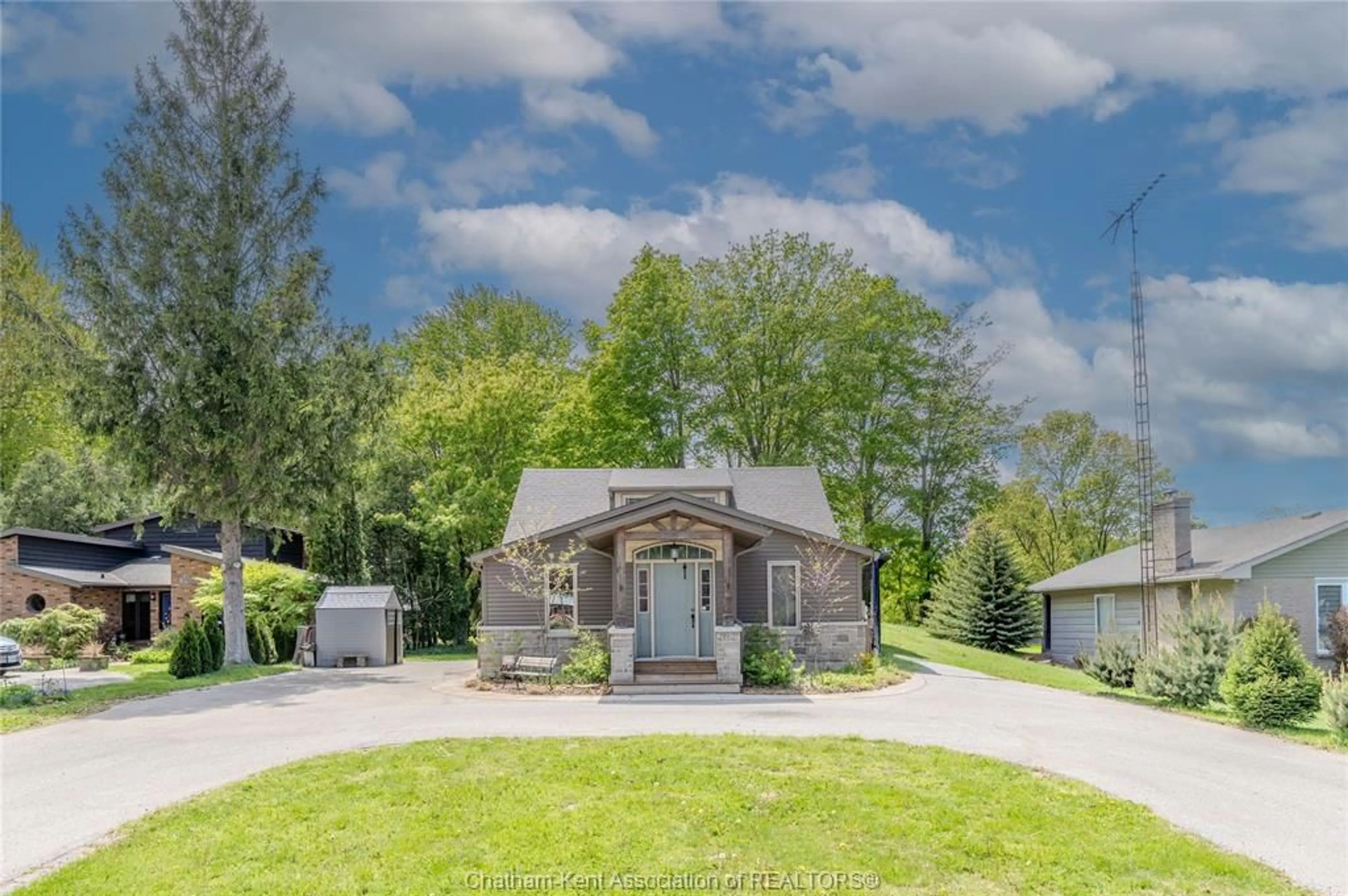 A pic from outside/outdoor area/front of a property/back of a property/a pic from drone, street for 22788 Creek Rd, Chatham Ontario N7M 0L4