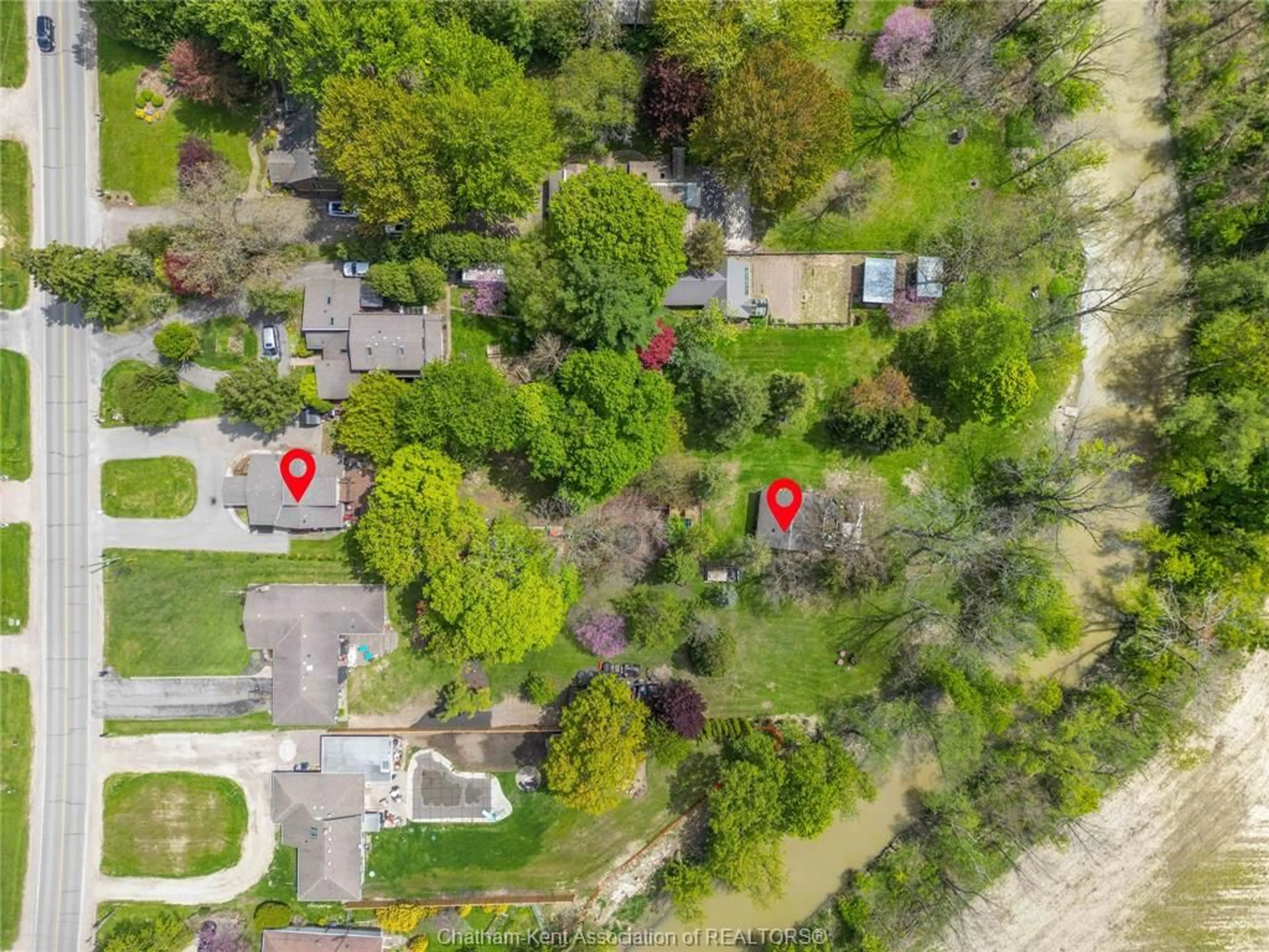 A pic from outside/outdoor area/front of a property/back of a property/a pic from drone, street for 22788 Creek Rd, Chatham Ontario N7M 0L4