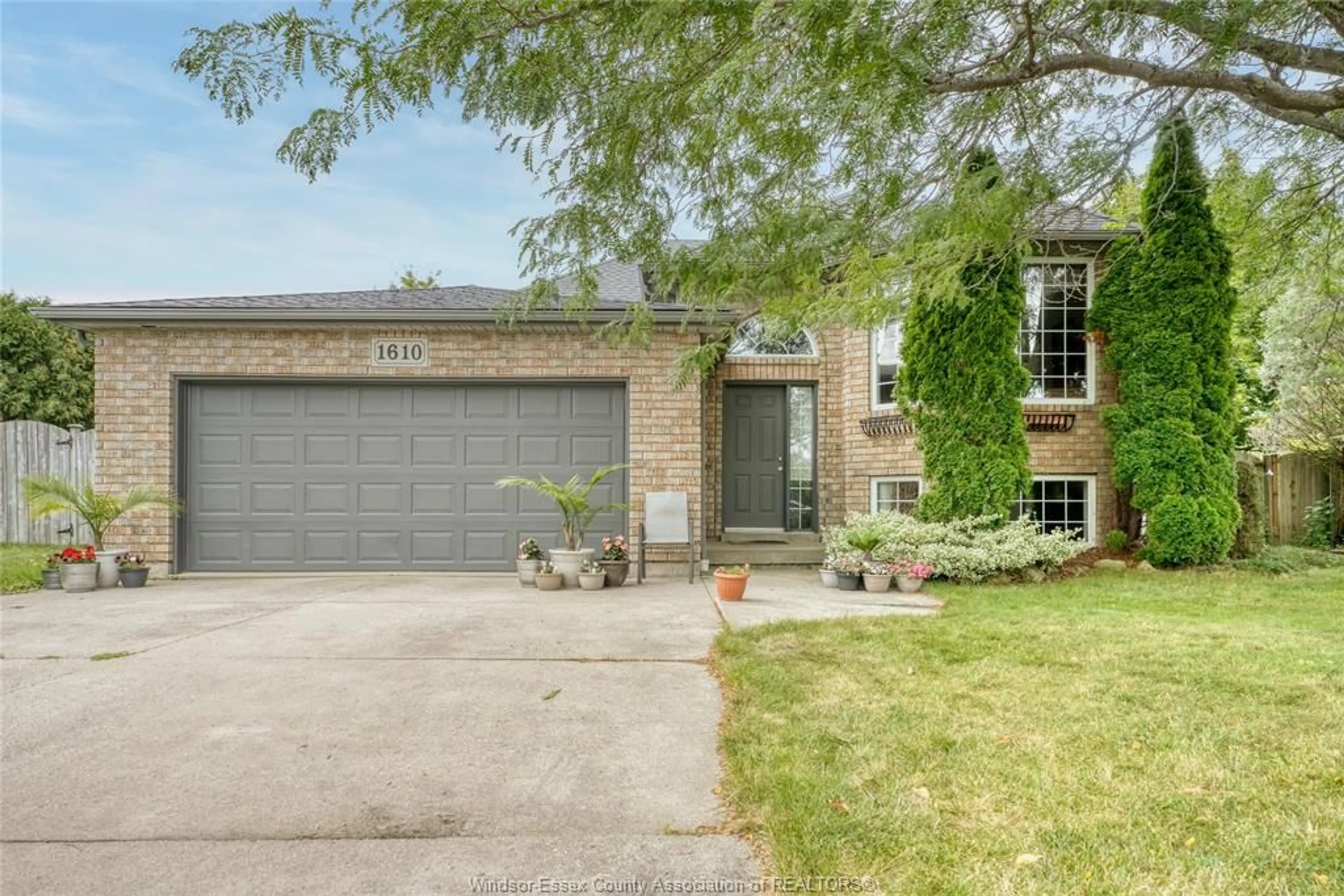 Home with brick exterior material, street for 1610 Chornoby Cres, Tecumseh Ontario N8N 4W3