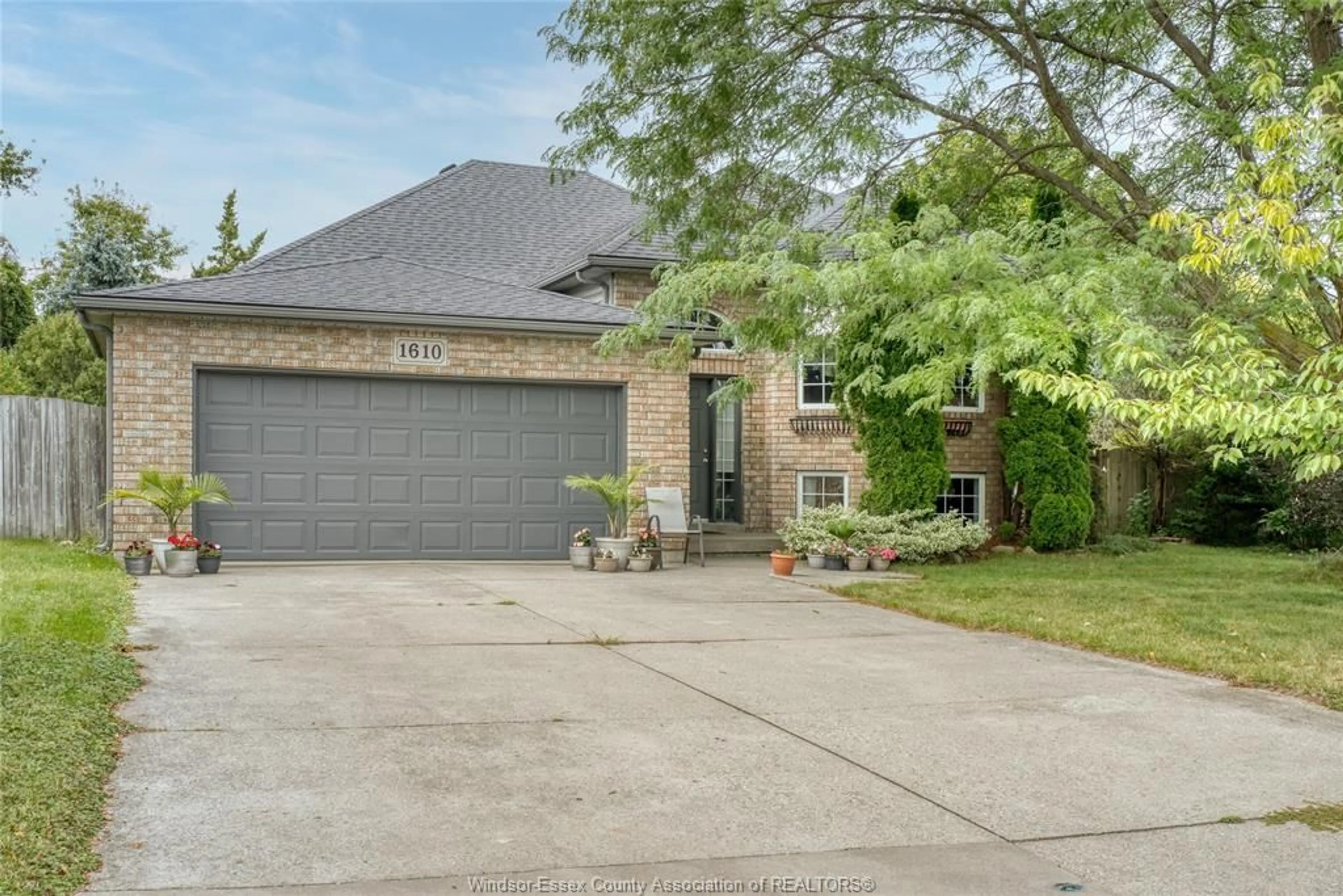 Home with brick exterior material, street for 1610 Chornoby Cres, Tecumseh Ontario N8N 4W3