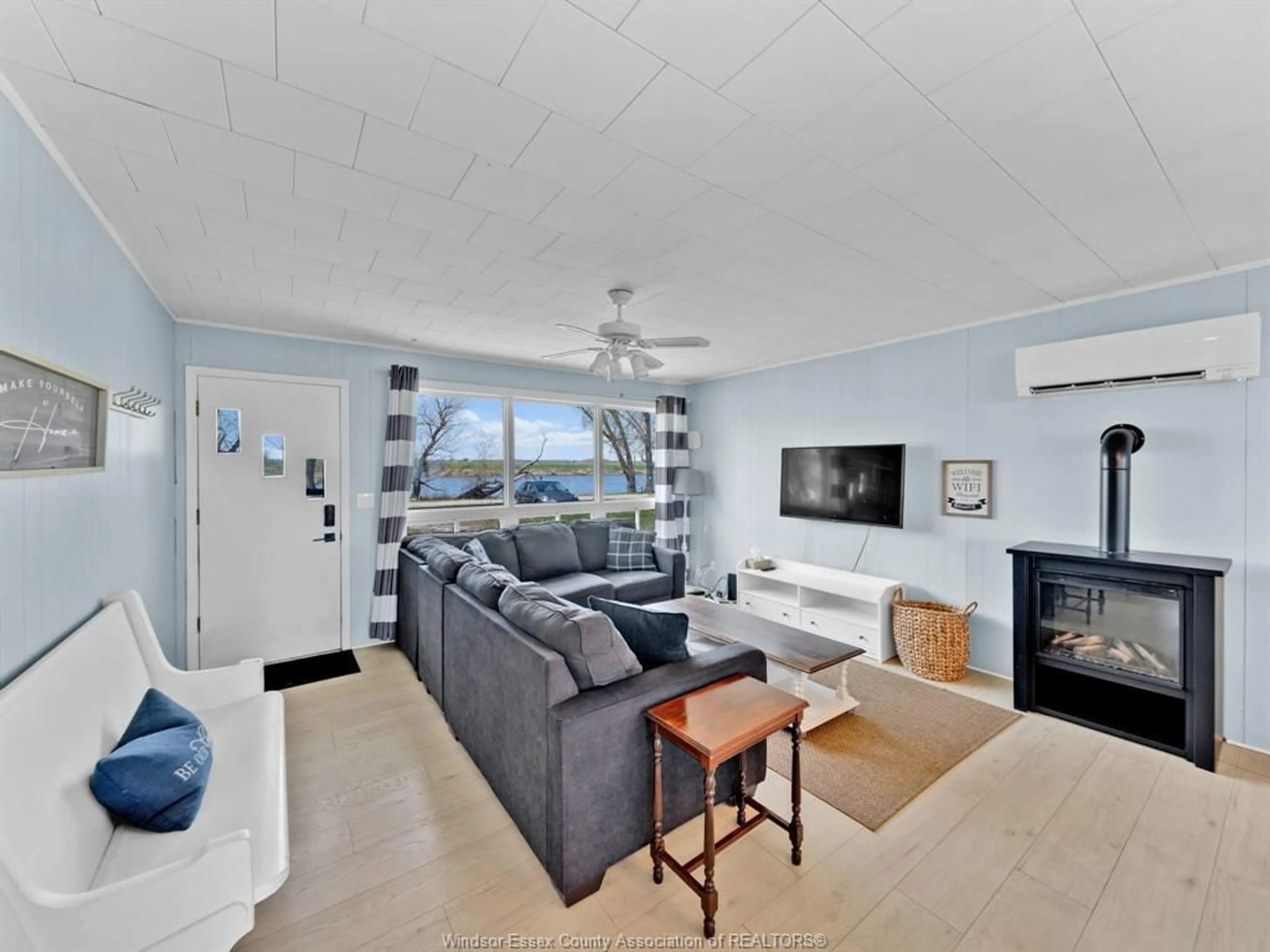 Living room with furniture, unknown for 83 Marentette Beach Dr, Leamington Ontario N8H 3V7
