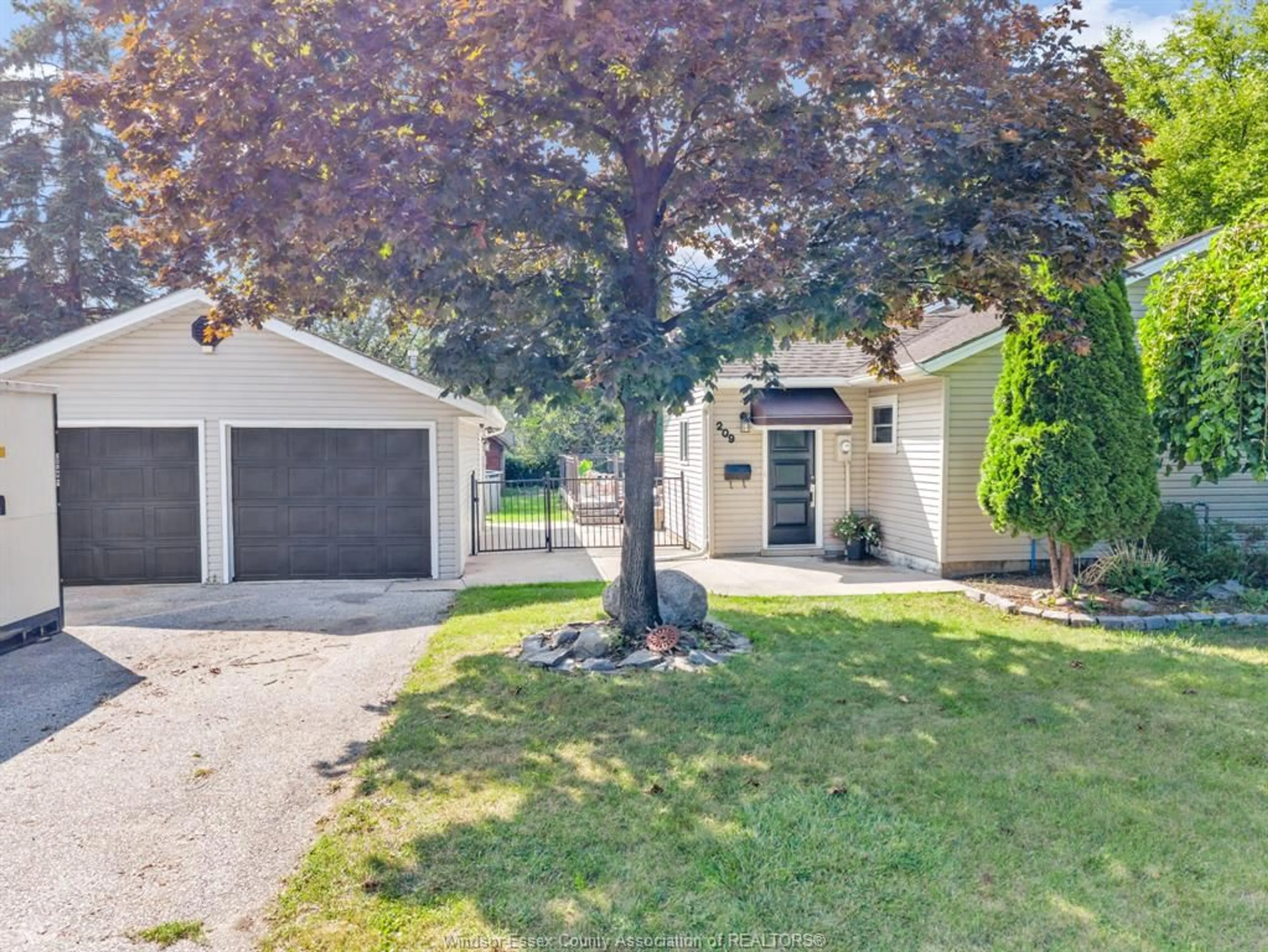 A pic from outside/outdoor area/front of a property/back of a property/a pic from drone, street for 209 ST. ANDREWS, Lakeshore Ontario N8N 3L4