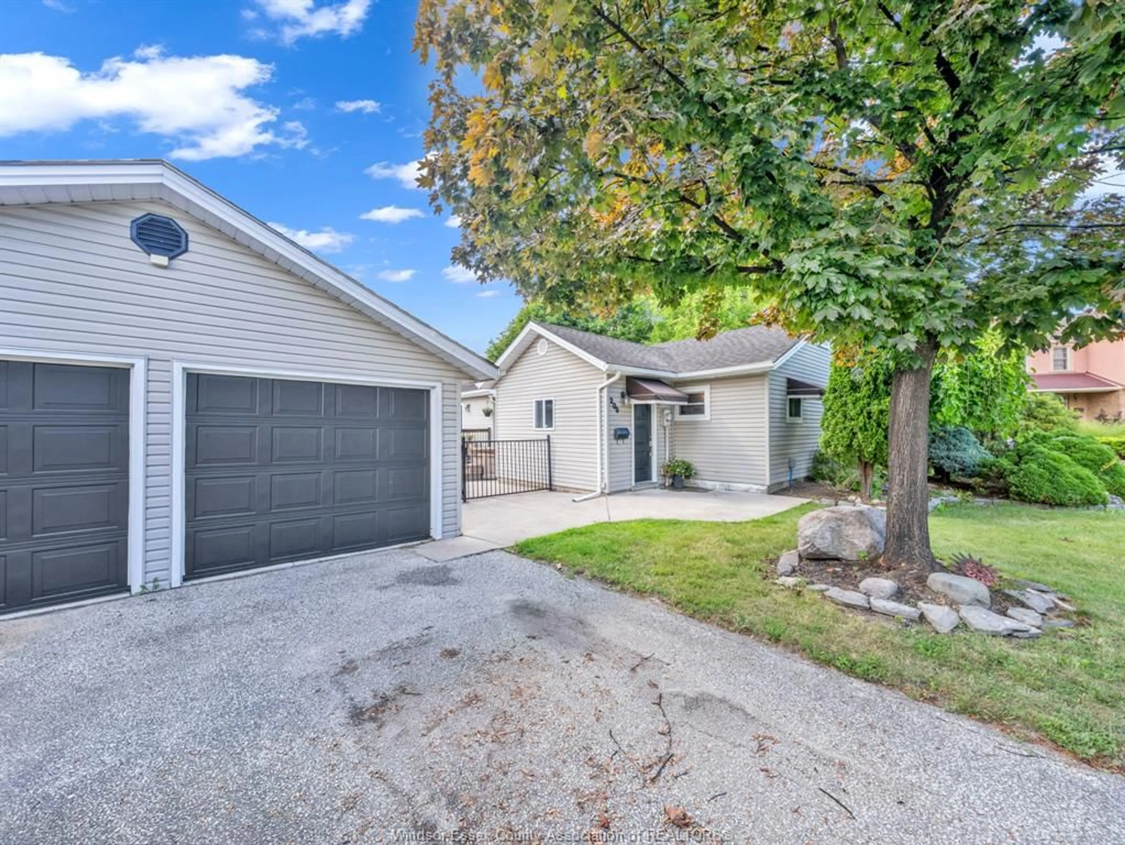 Home with vinyl exterior material, street for 209 ST. ANDREWS, Lakeshore Ontario N8N 3L4