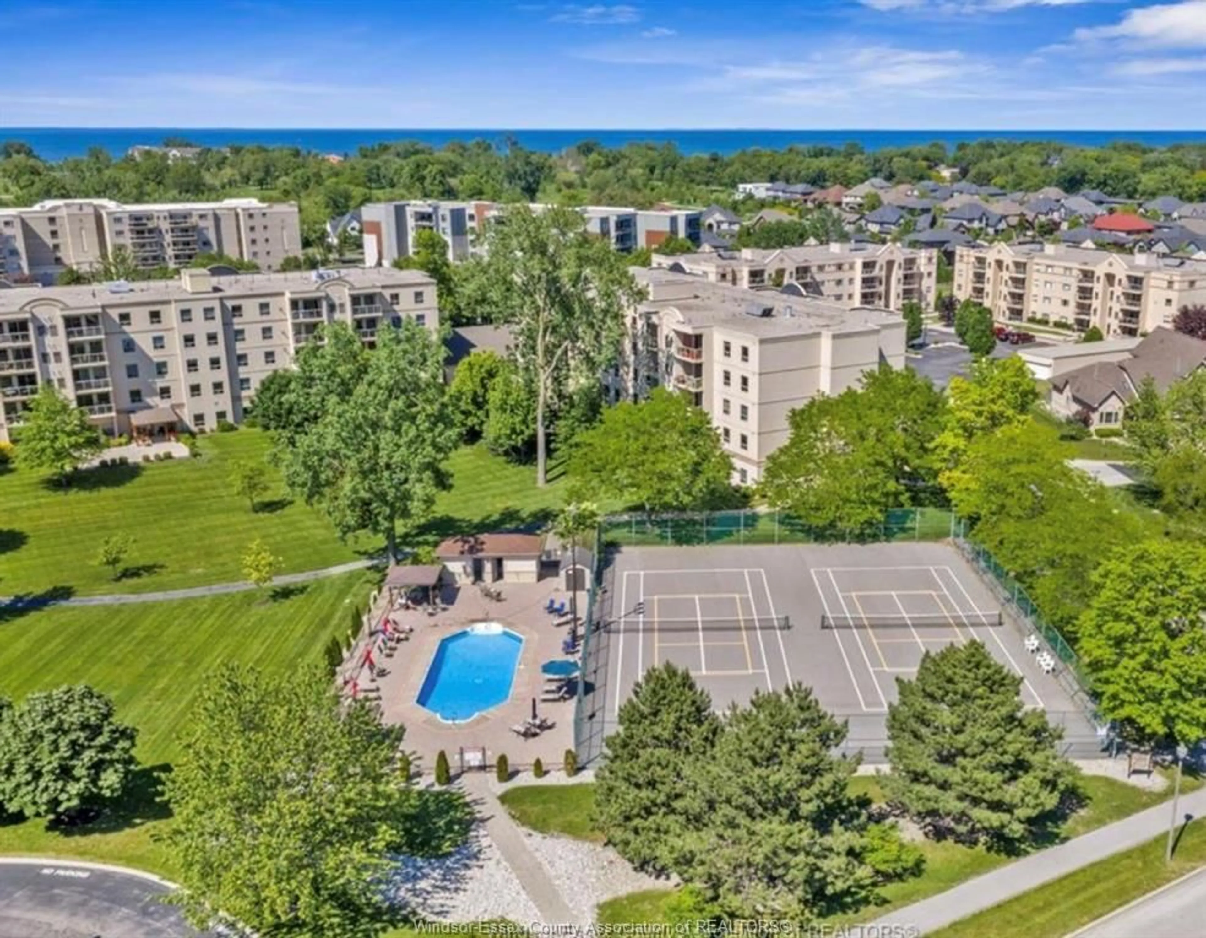 A pic from outside/outdoor area/front of a property/back of a property/a pic from drone, unknown for 395 TUSCANY, Tecumseh Ontario N8N 4W6