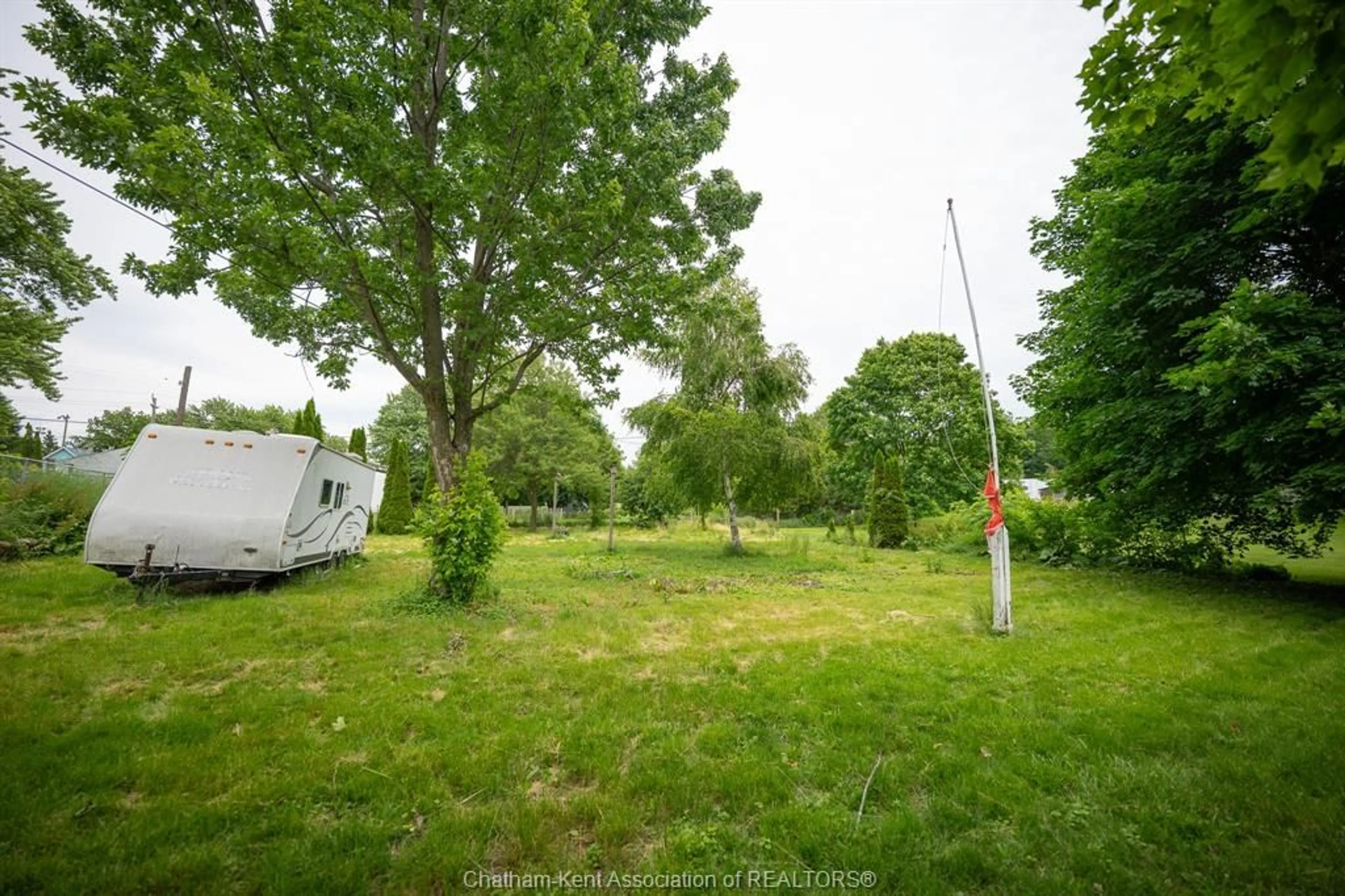 A pic from outside/outdoor area/front of a property/back of a property/a pic from drone, forest/trees view for 249 VICTORIA St, Highgate Ontario N0P 1T0