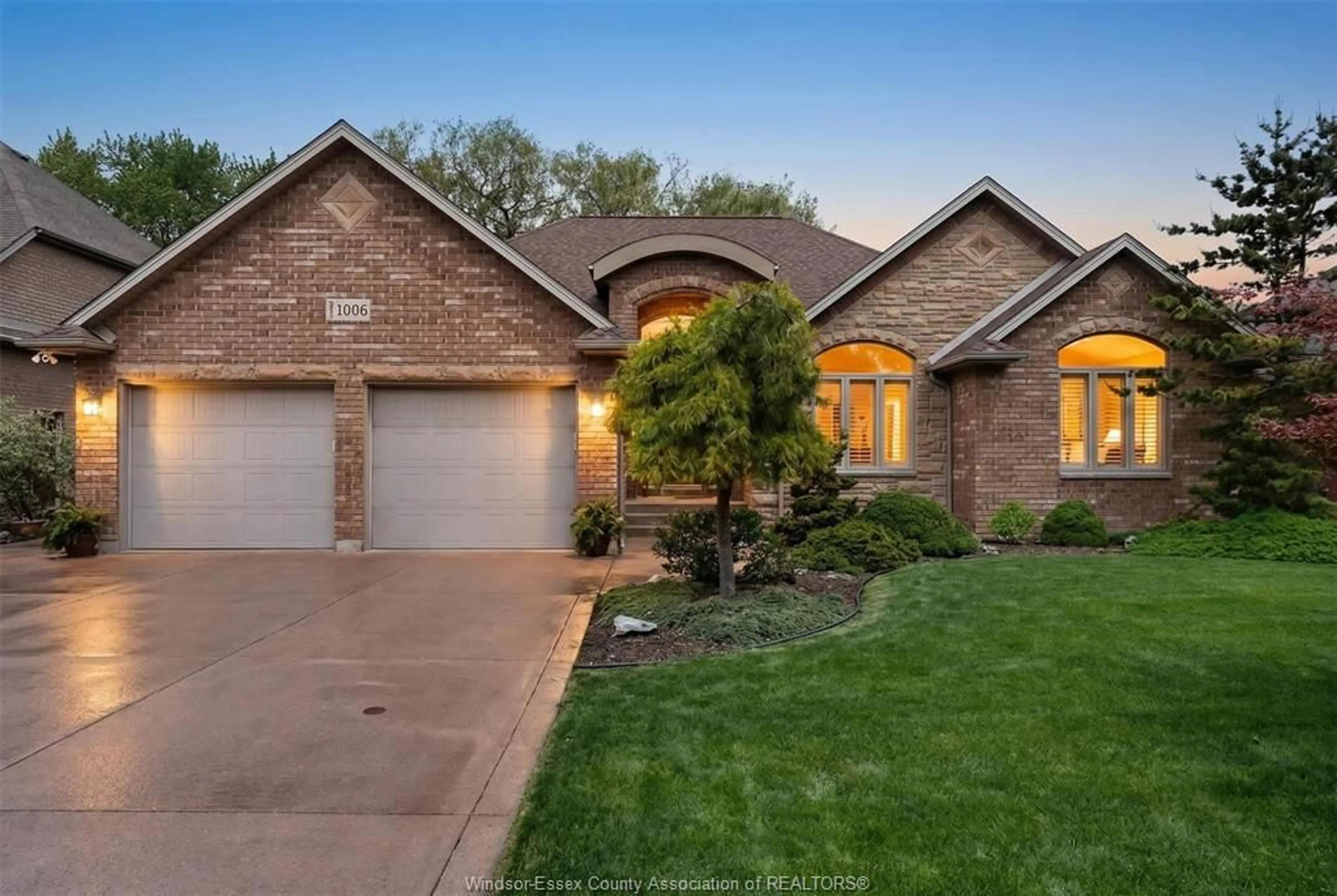 Home with brick exterior material, street for 1006 CHELSEA PARK Way, Lakeshore Ontario N0R 1A0