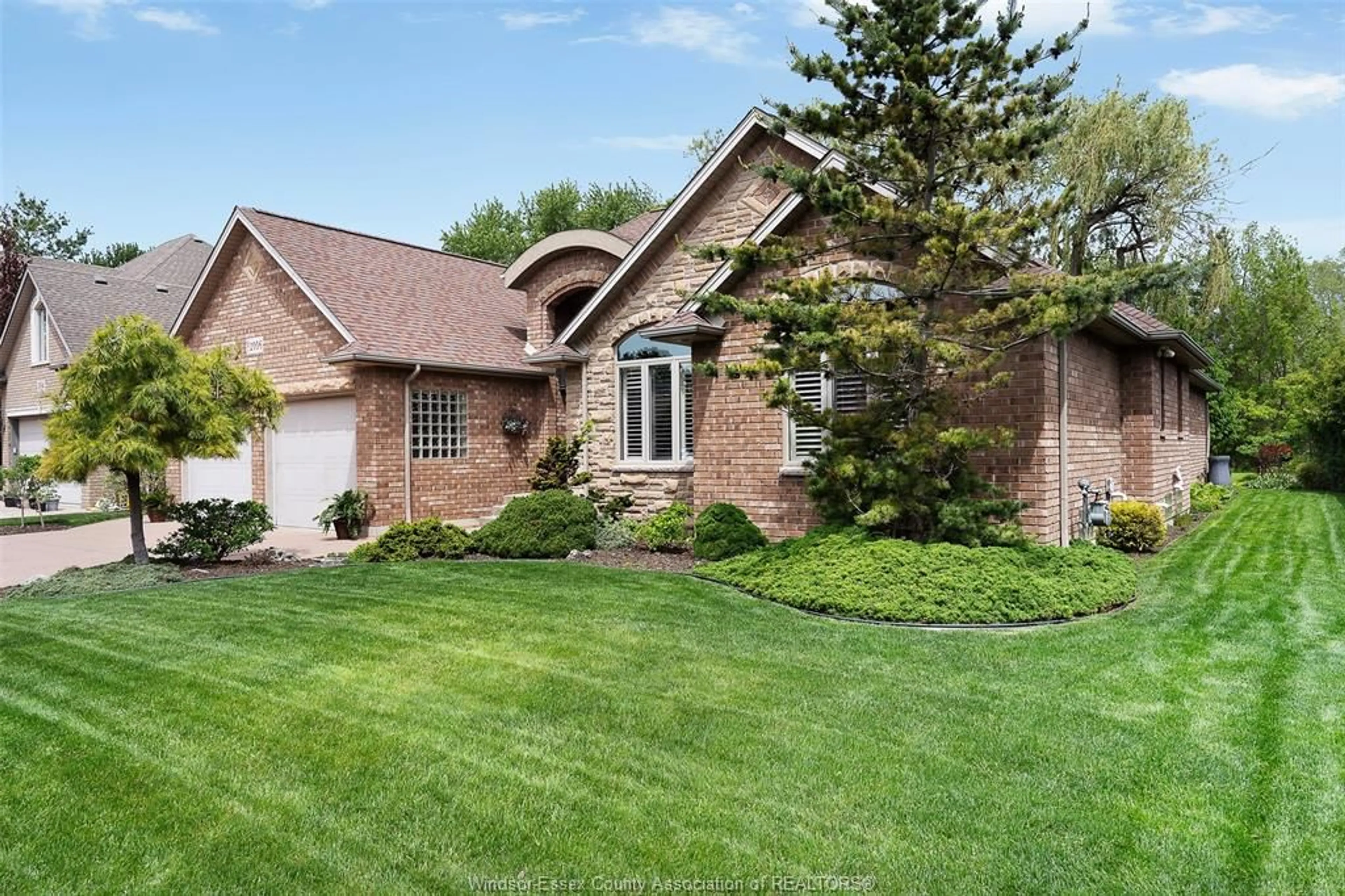 Home with brick exterior material, street for 1006 CHELSEA PARK Way, Lakeshore Ontario N0R 1A0