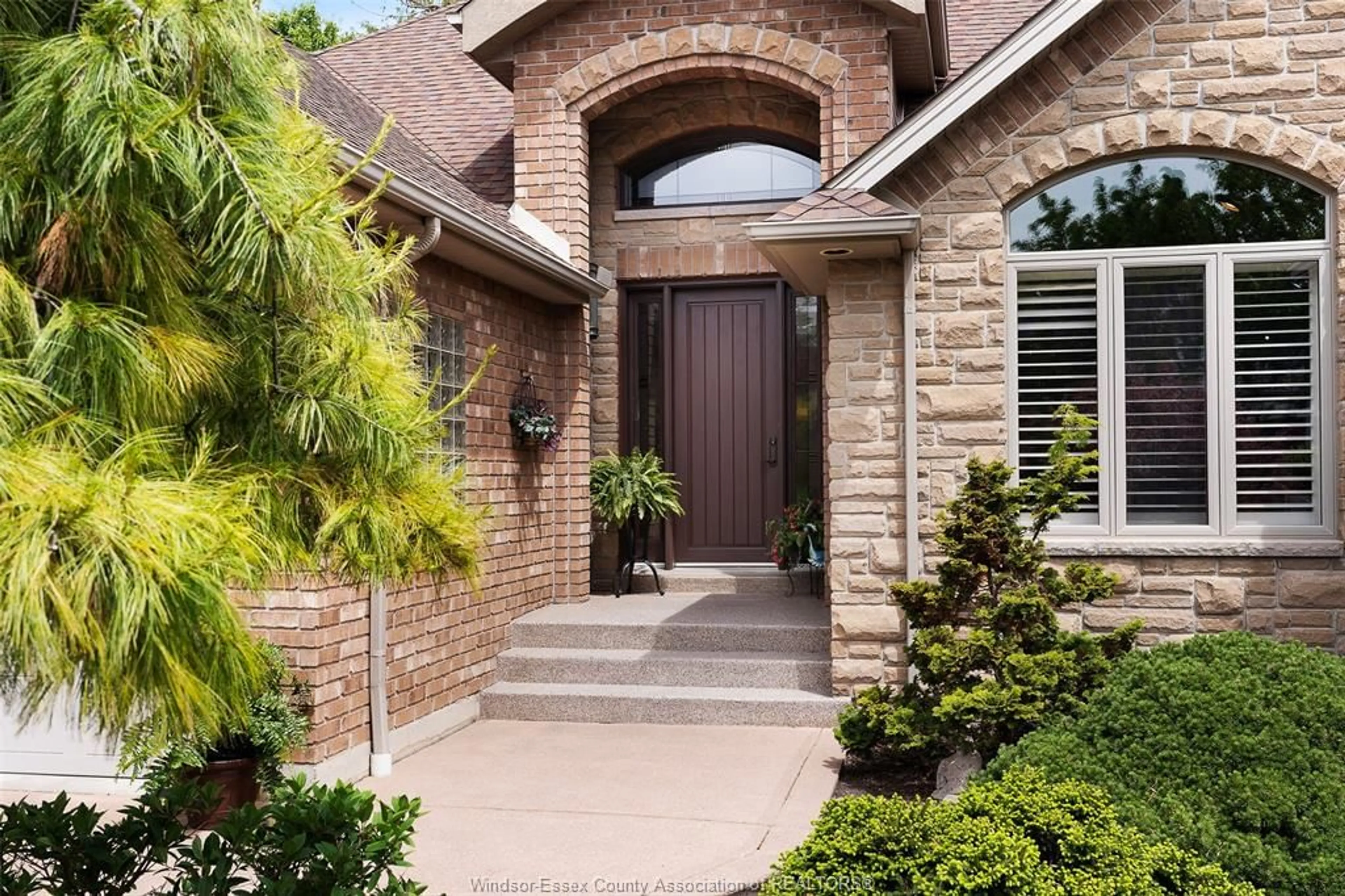 Home with brick exterior material, street for 1006 CHELSEA PARK Way, Lakeshore Ontario N0R 1A0