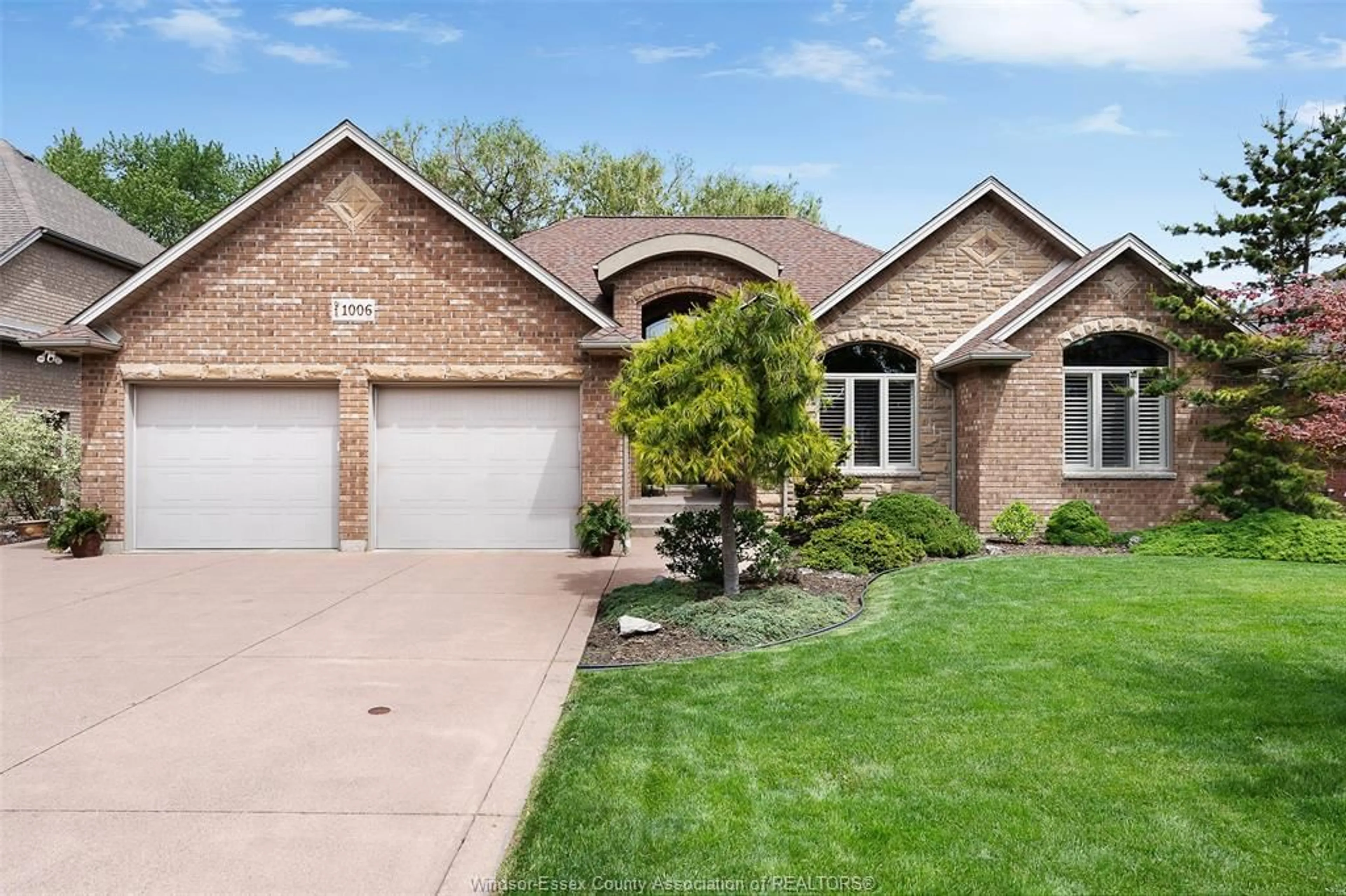 Home with brick exterior material, street for 1006 CHELSEA PARK Way, Lakeshore Ontario N0R 1A0