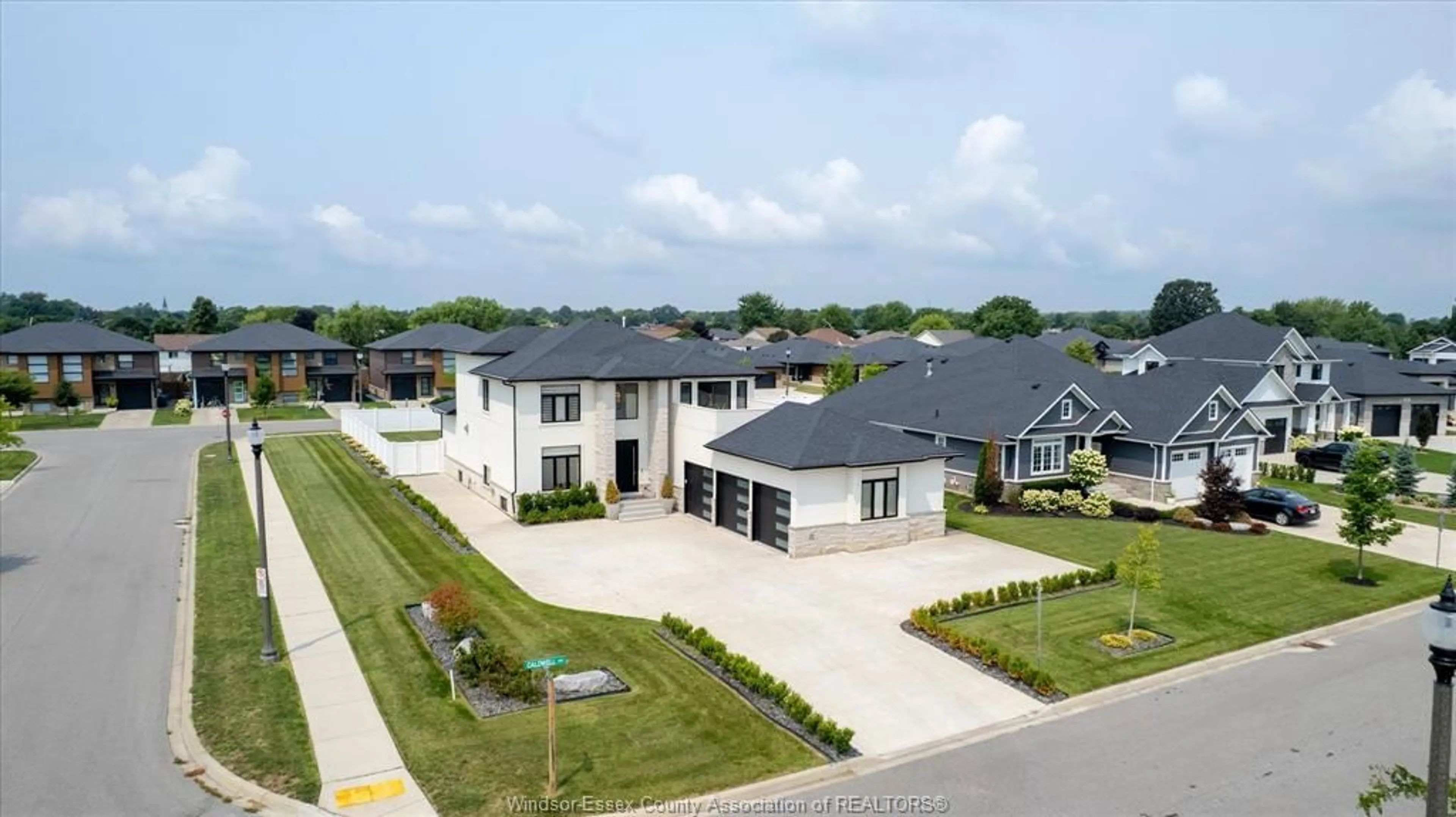 A pic from outside/outdoor area/front of a property/back of a property/a pic from drone, street for 501 CALDWELL Crt, Amherstburg Ontario N9V 0G4