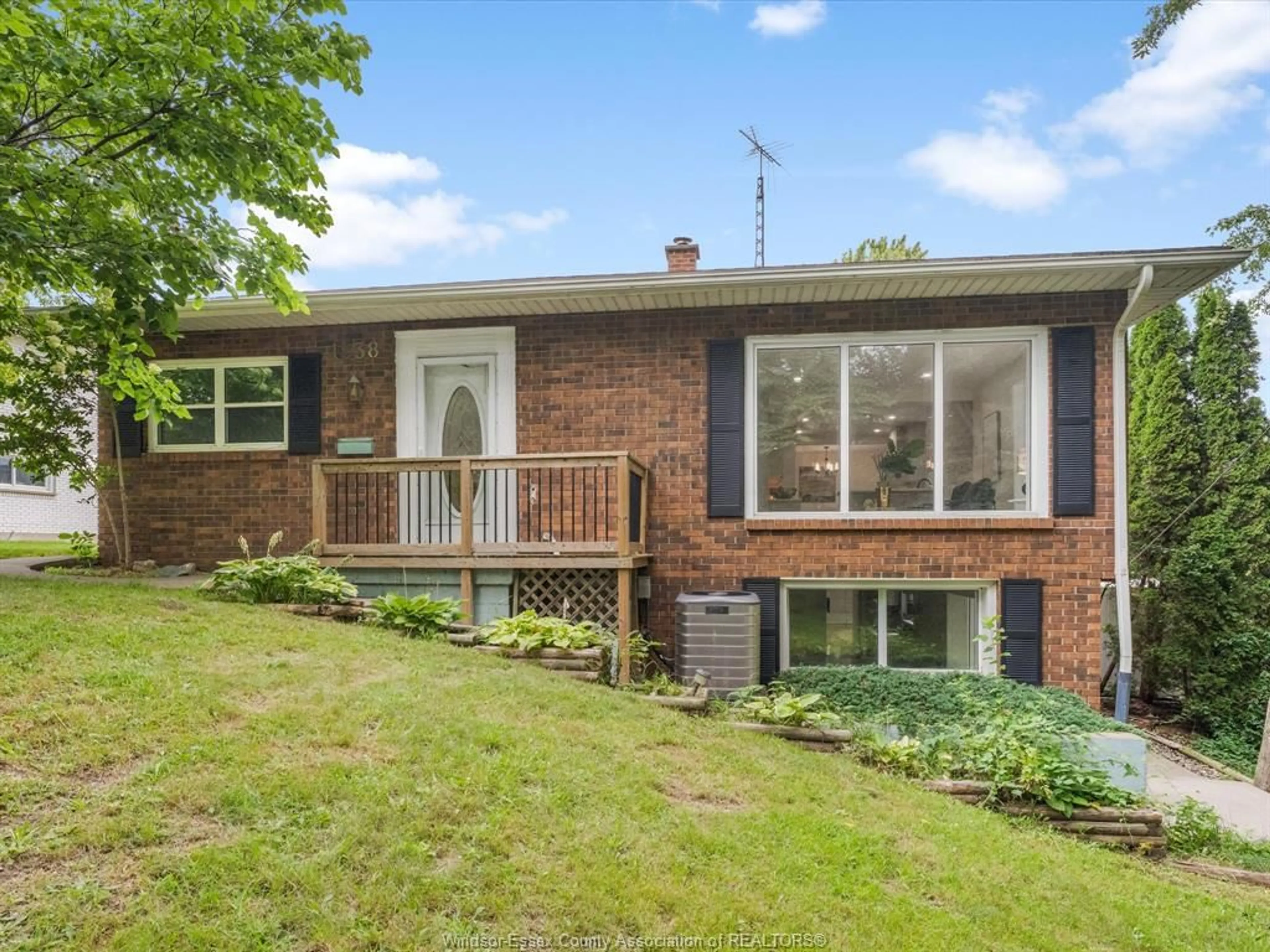 Home with brick exterior material, street for 1838 SEACLIFF Dr, Kingsville Ontario N9Y 2M6