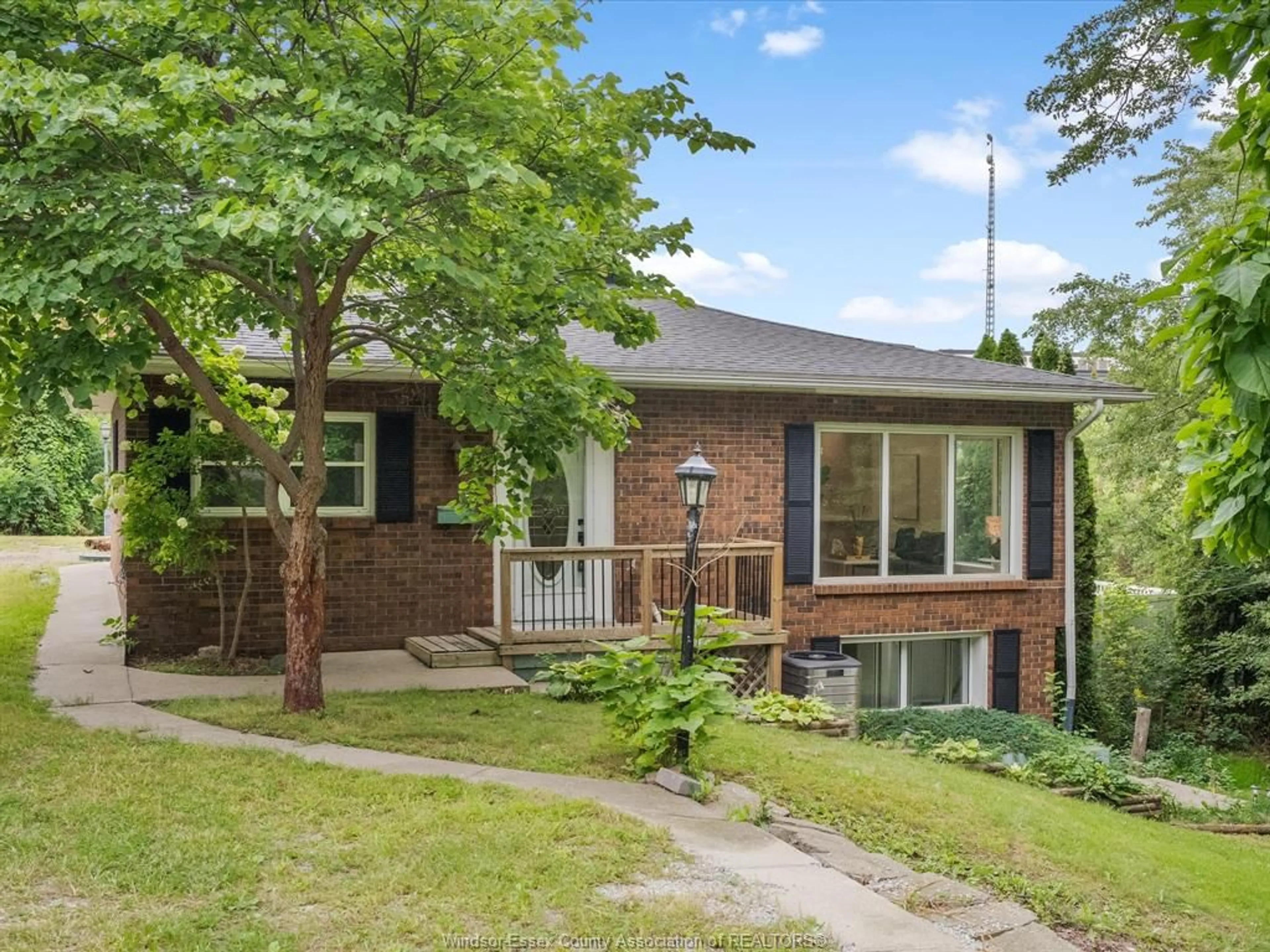 Home with brick exterior material, street for 1838 SEACLIFF Dr, Kingsville Ontario N9Y 2M6