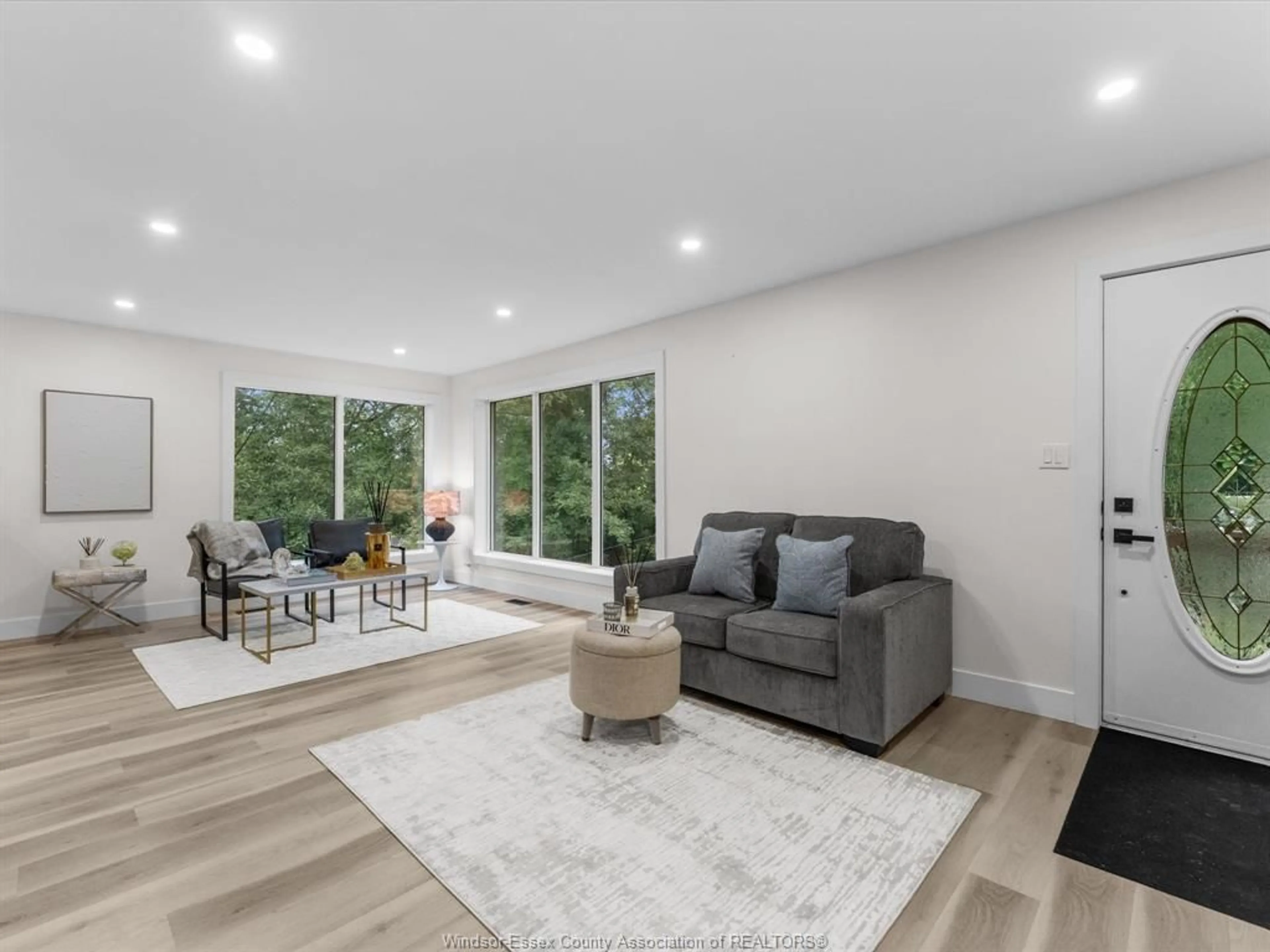 Living room with furniture, wood/laminate floor for 1838 SEACLIFF Dr, Kingsville Ontario N9Y 2M6
