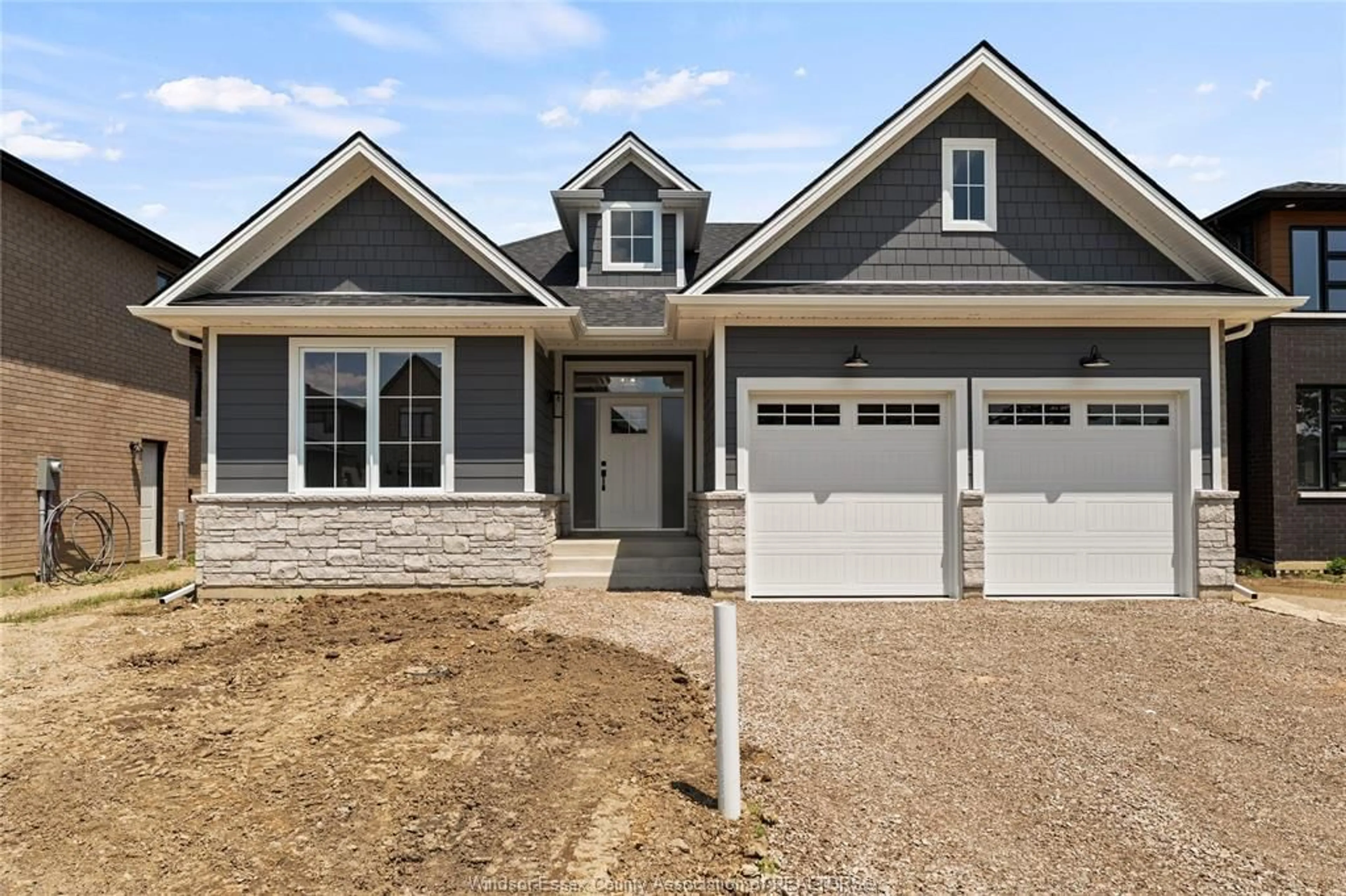 Home with vinyl exterior material, street for 5209 RAFAEL St, Tecumseh Ontario N0R 1K0
