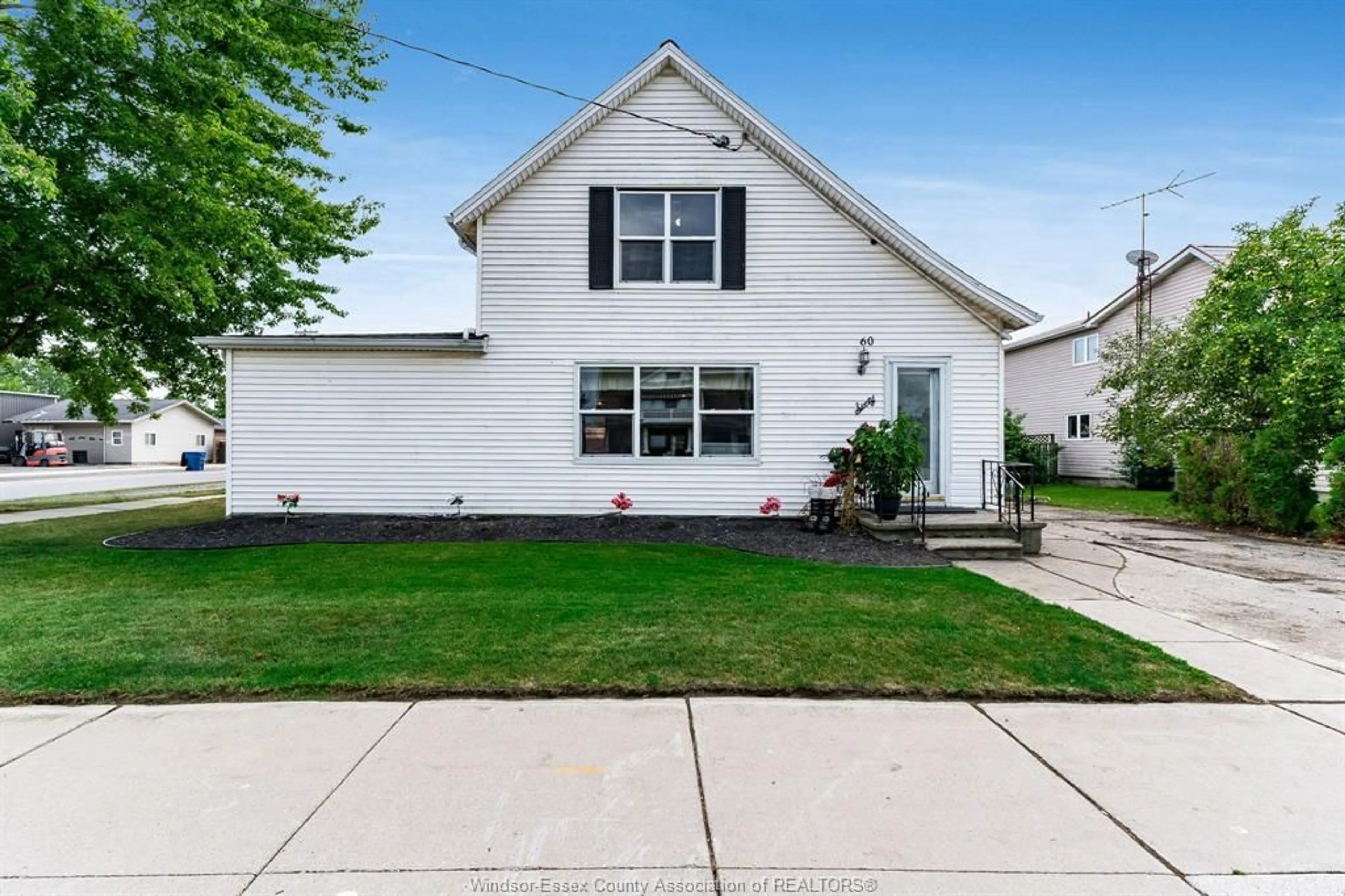 Home with vinyl exterior material, street for 60 Talbot Rd, Wheatley Ontario N0P 2P0