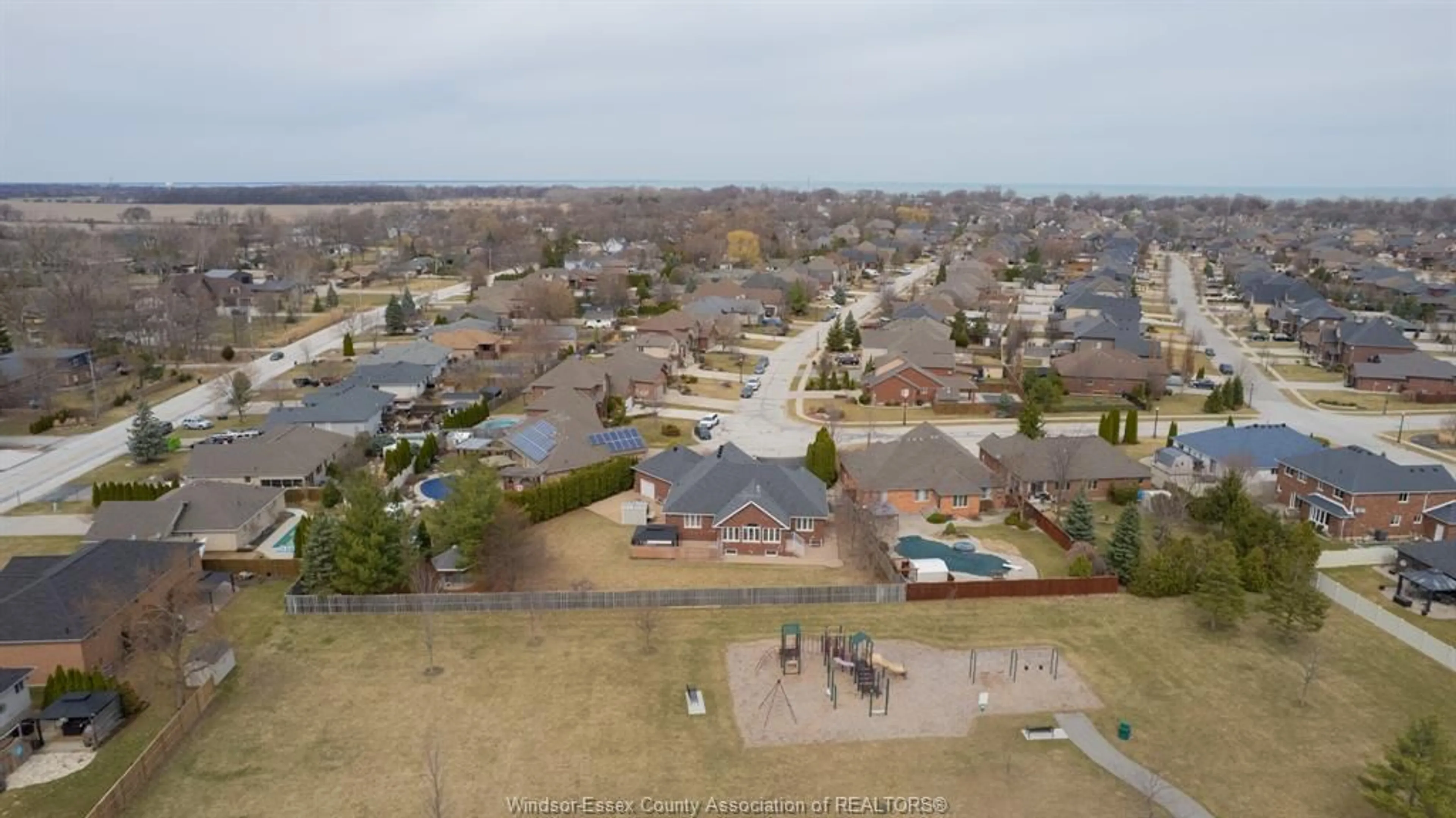 A pic from outside/outdoor area/front of a property/back of a property/a pic from drone, water/lake/river/ocean view for 389 PINEHURST Dr, Lakeshore Ontario N8L 0X4