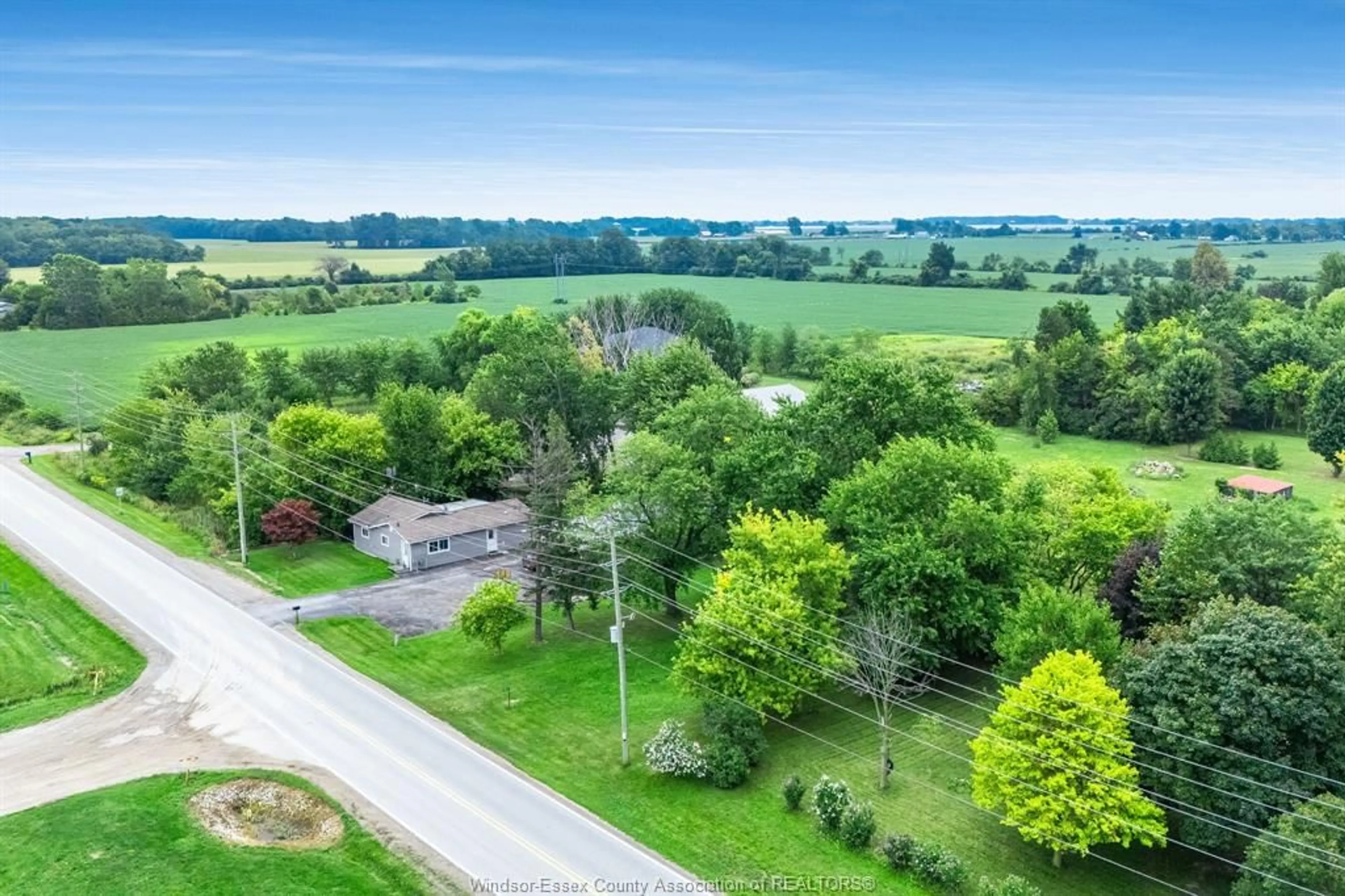 A pic from outside/outdoor area/front of a property/back of a property/a pic from drone, unknown for 99 Road 4, Kingsville Ontario N9Y 2E5