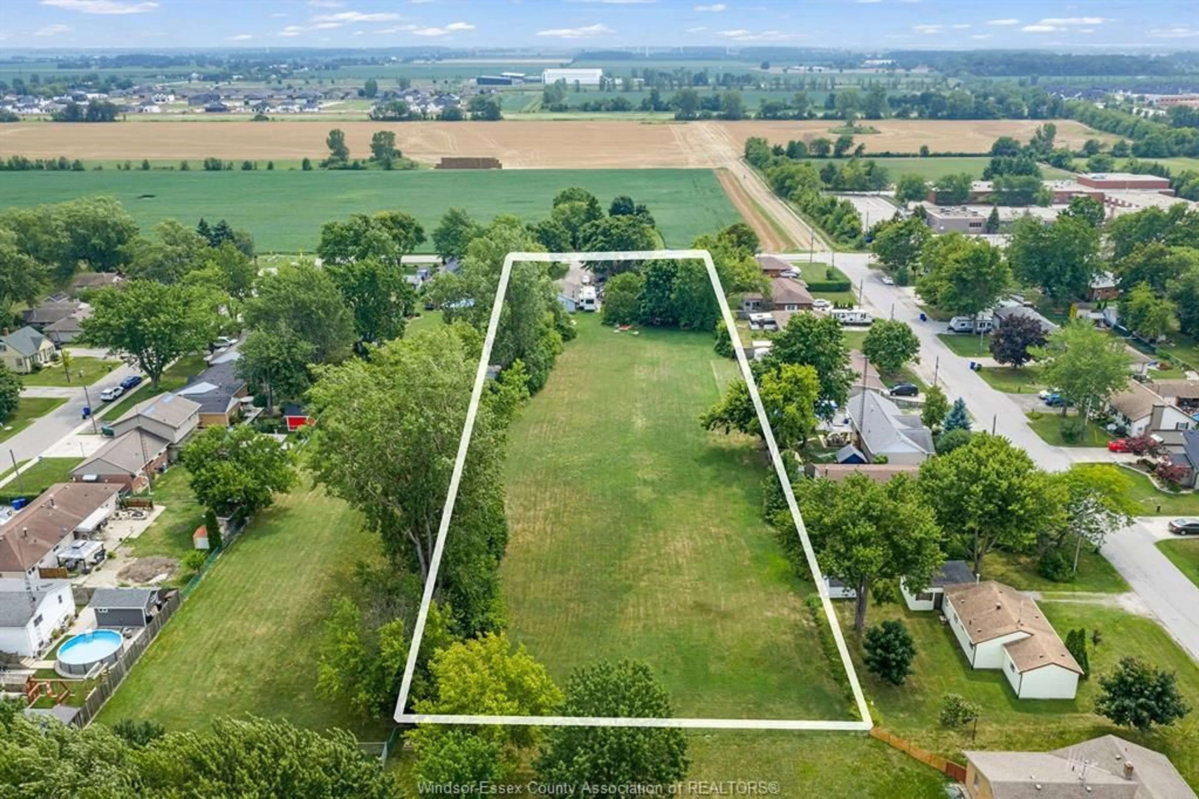 A pic from outside/outdoor area/front of a property/back of a property/a pic from drone, unknown for 1228 FAITH Dr, Lakeshore Ontario N0R 1C0