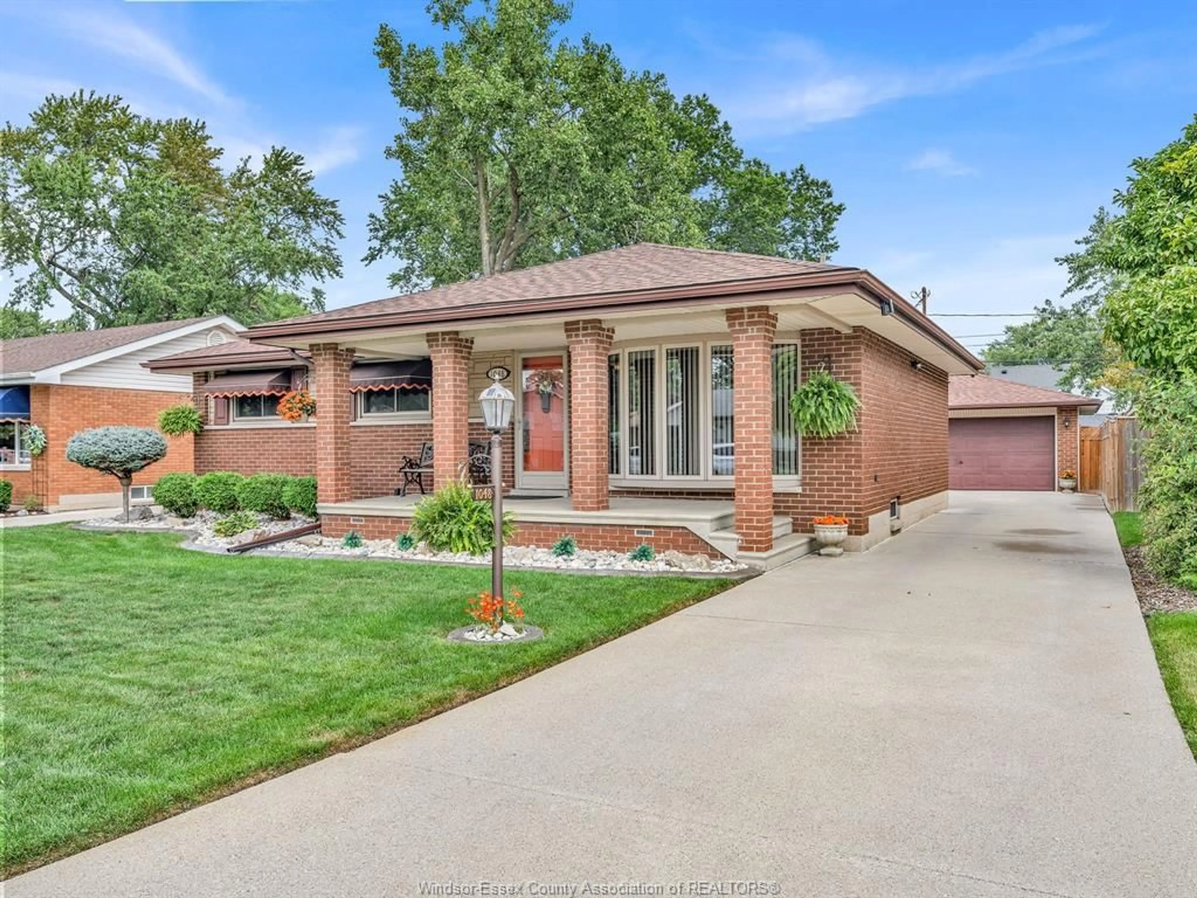 Home with brick exterior material, street for 1048 COVENTRY Crt, Windsor Ontario N8S 2W7