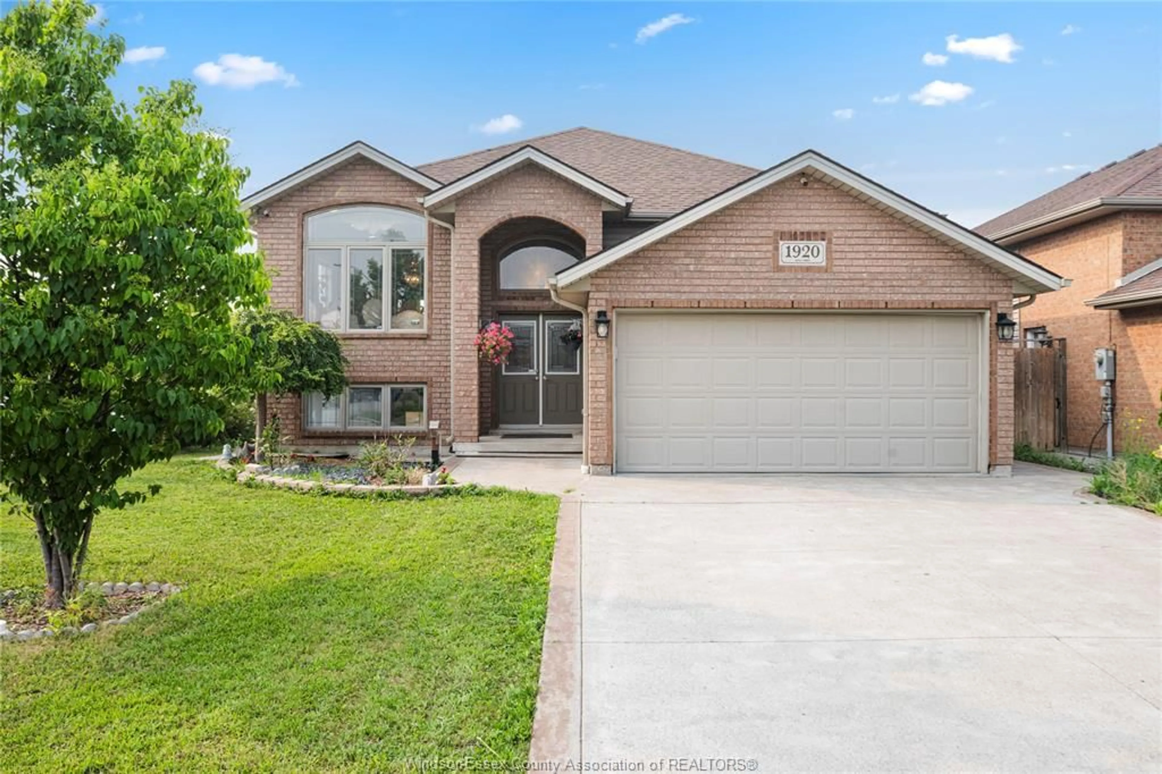 Home with brick exterior material, street for 1920 MANITOBA St, Windsor Ontario N9B 3H8
