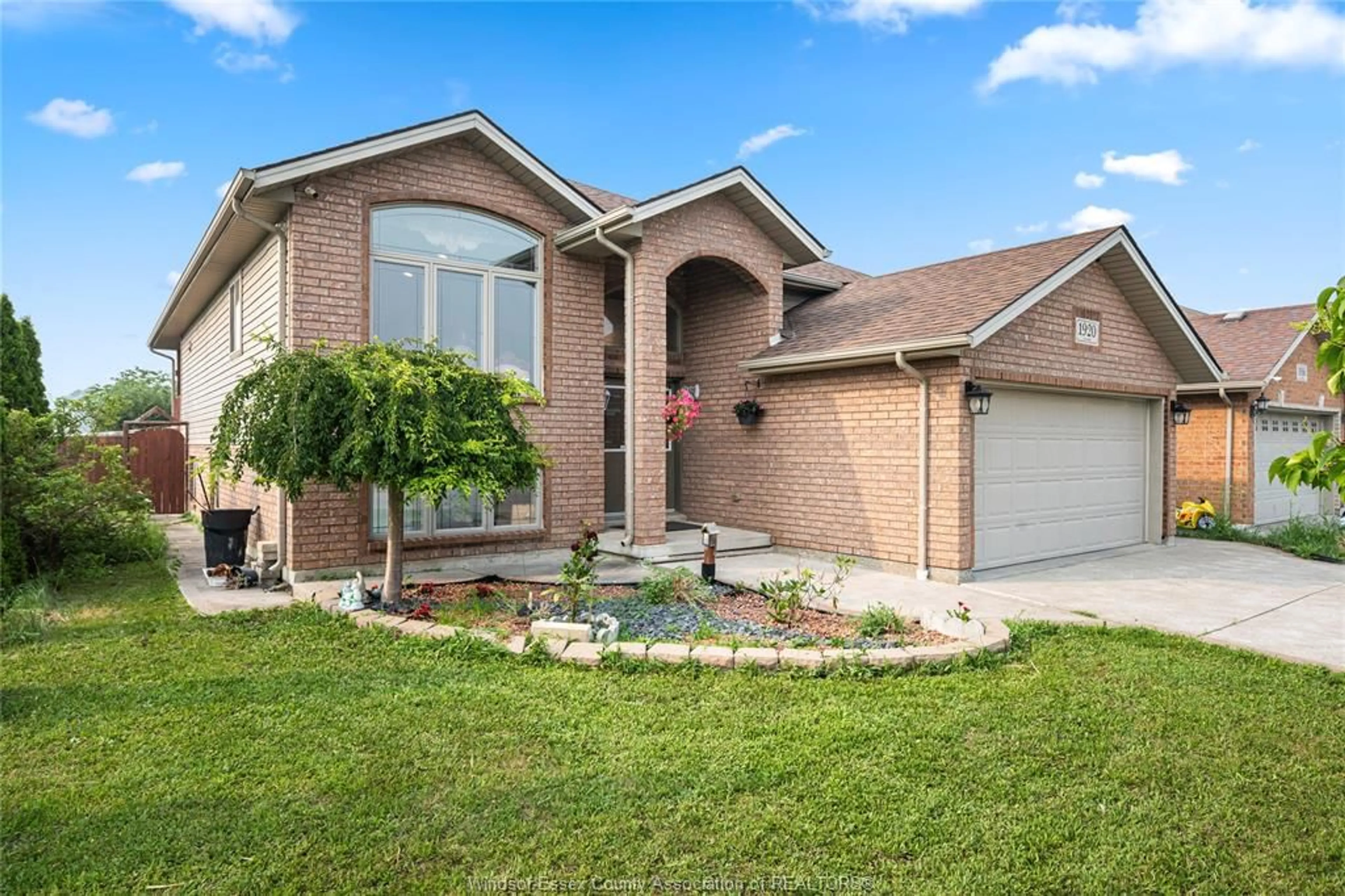Home with brick exterior material, street for 1920 MANITOBA St, Windsor Ontario N9B 3H8