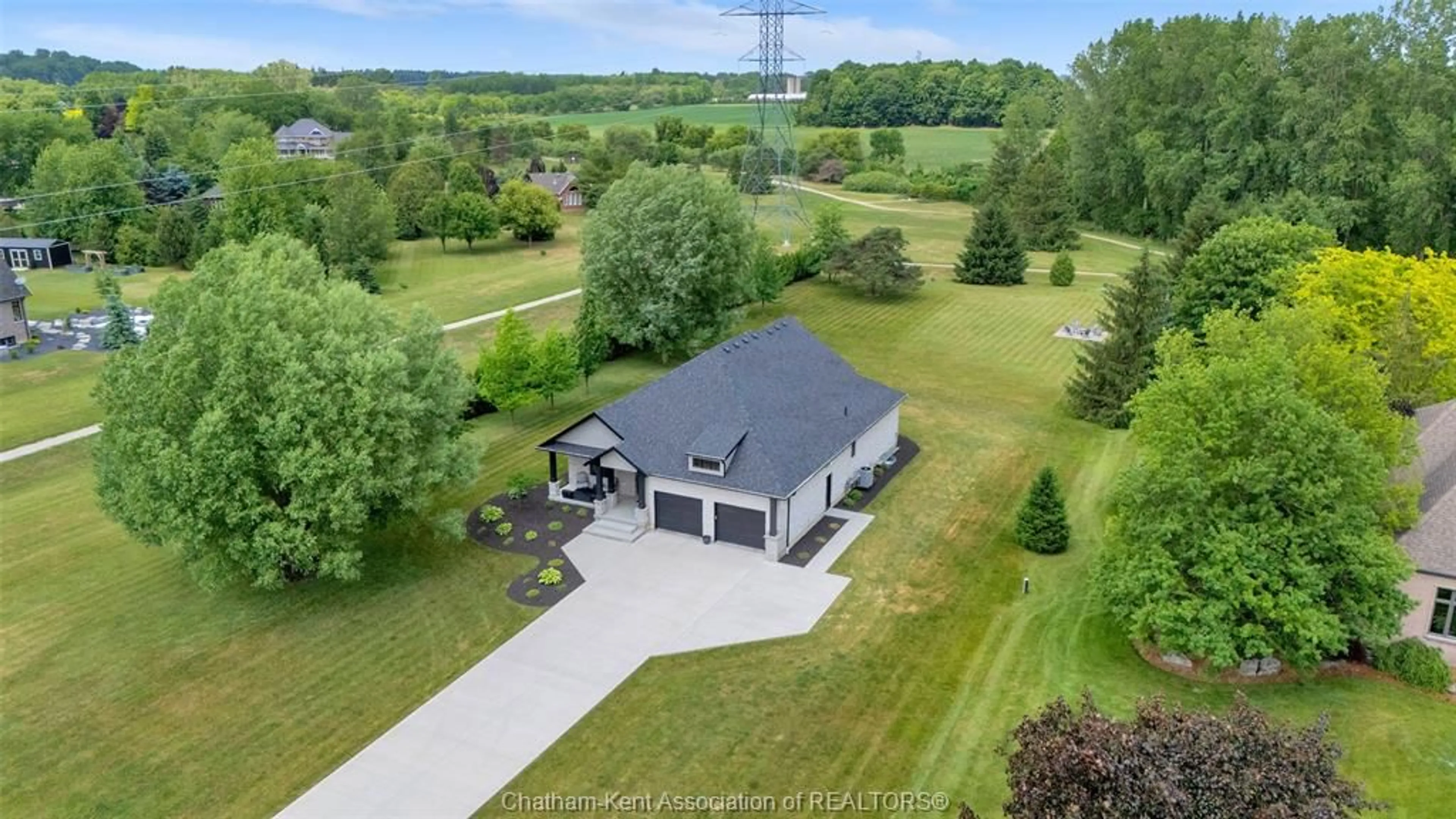 A pic from outside/outdoor area/front of a property/back of a property/a pic from drone, water/lake/river/ocean view for 21267 Adams Cres, Mckay's Corners Ontario N7M 5J3