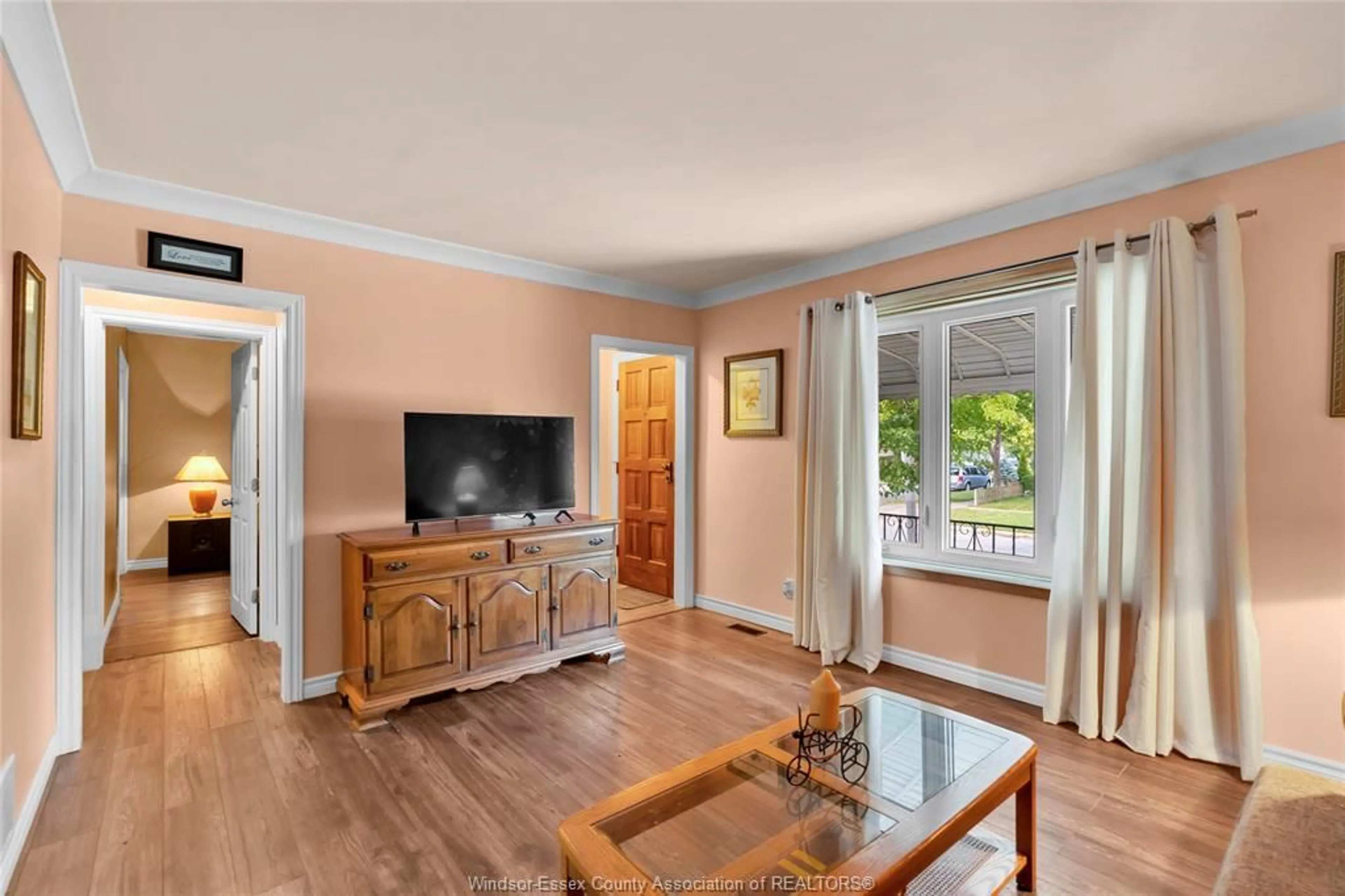 Living room with furniture, wood/laminate floor for 1903 ELLROSE Ave, Windsor Ontario N8W 4V1