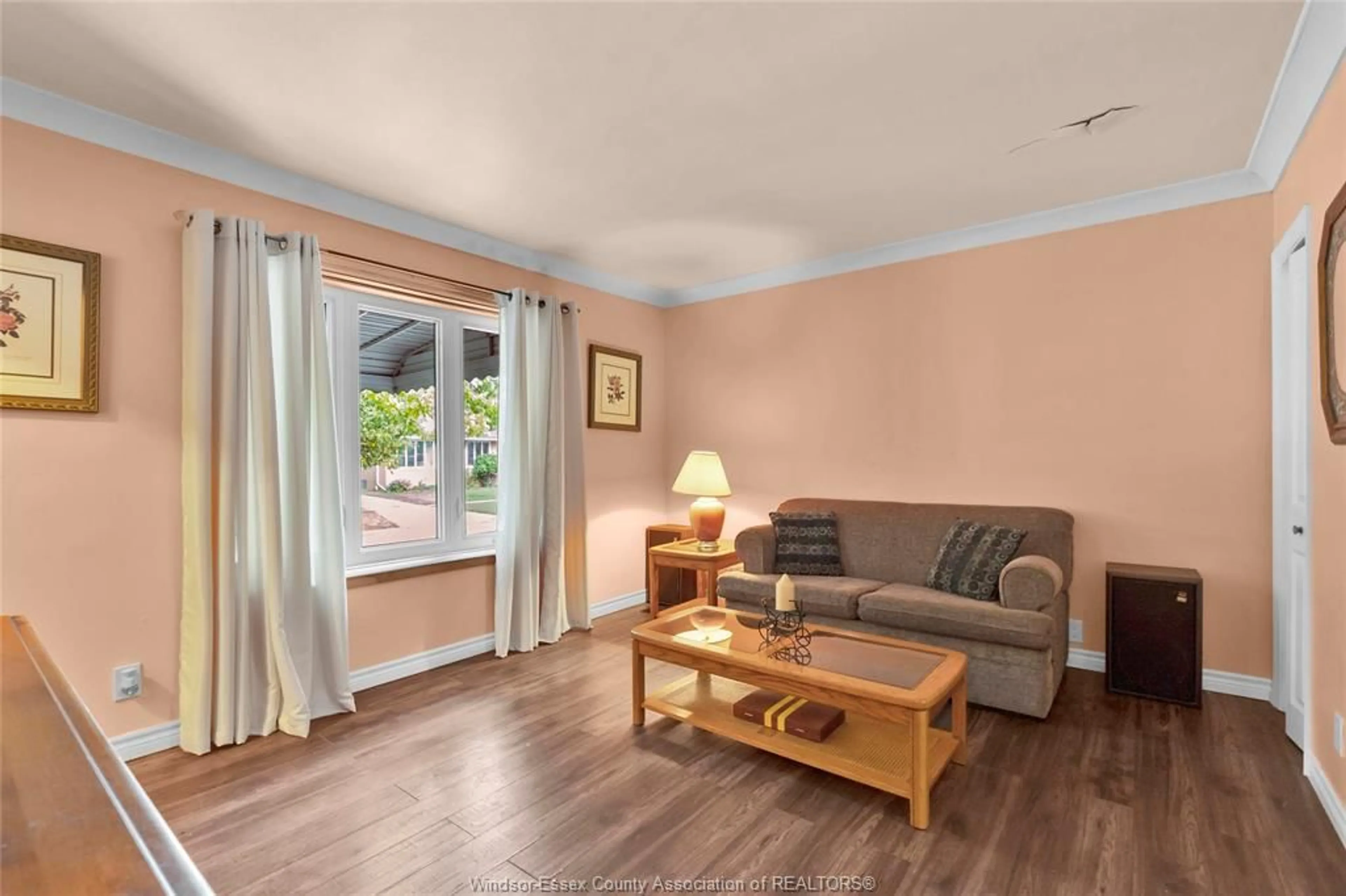Living room with furniture, wood/laminate floor for 1903 ELLROSE Ave, Windsor Ontario N8W 4V1