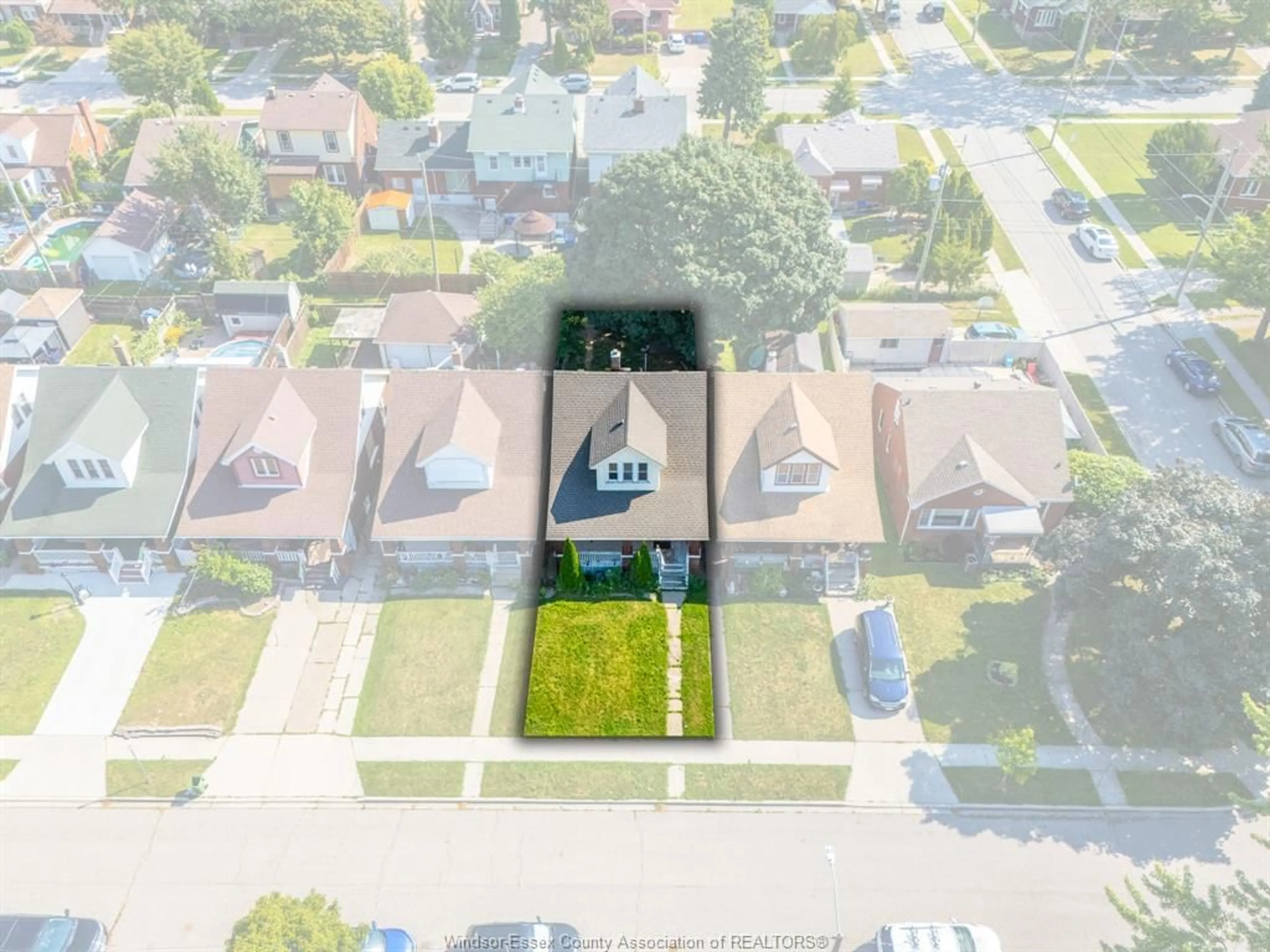 A pic from outside/outdoor area/front of a property/back of a property/a pic from drone, street for 2284 Fraser Ave, Windsor Ontario N8X 3Z7