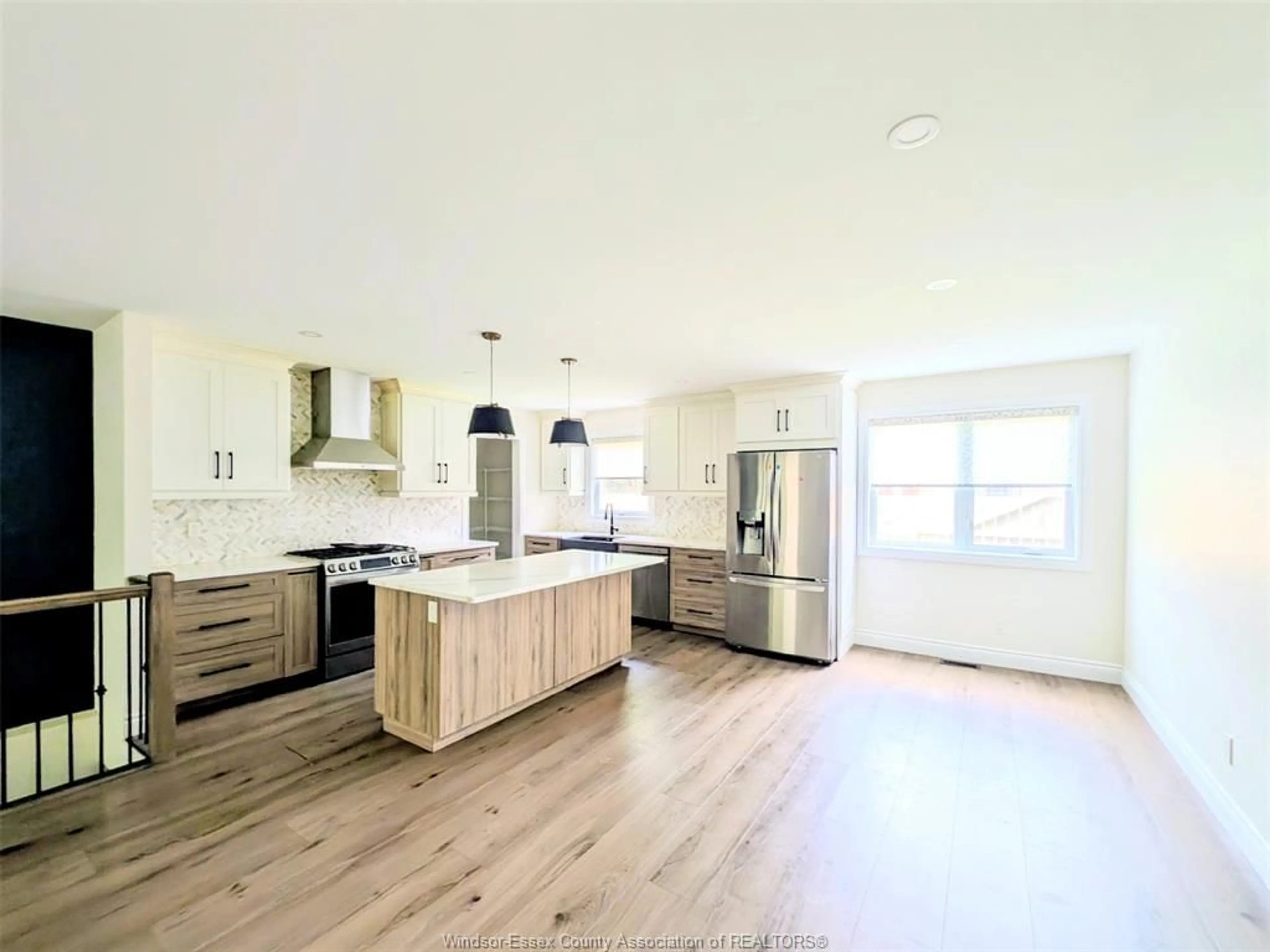 Open concept kitchen, wood/laminate floor for 3617 TURNER Rd, Windsor Ontario N8W 3M9