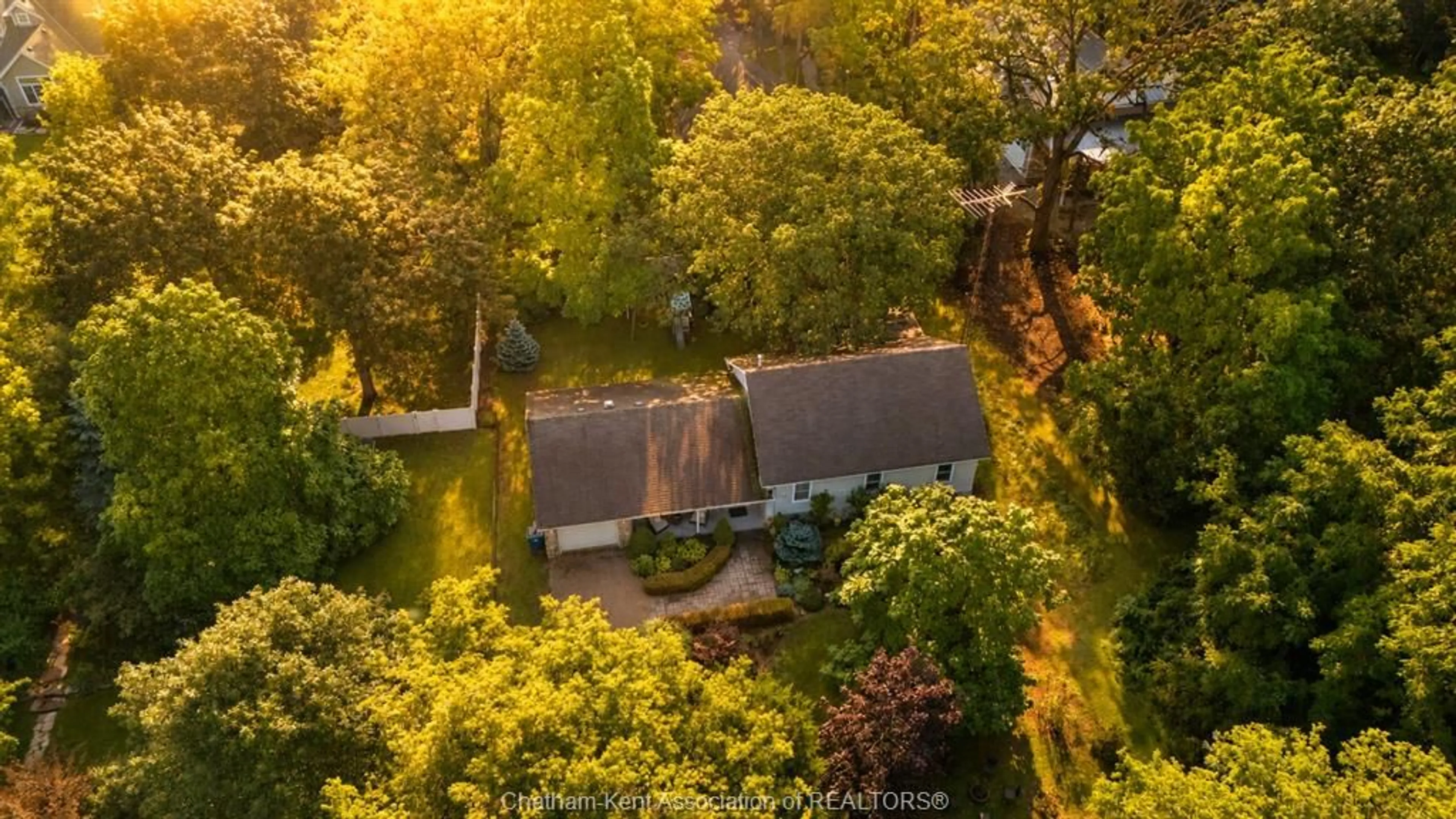 A pic from outside/outdoor area/front of a property/back of a property/a pic from drone, forest/trees view for 11706 Rose Beach Line, Morpeth Ontario N0P 1X0