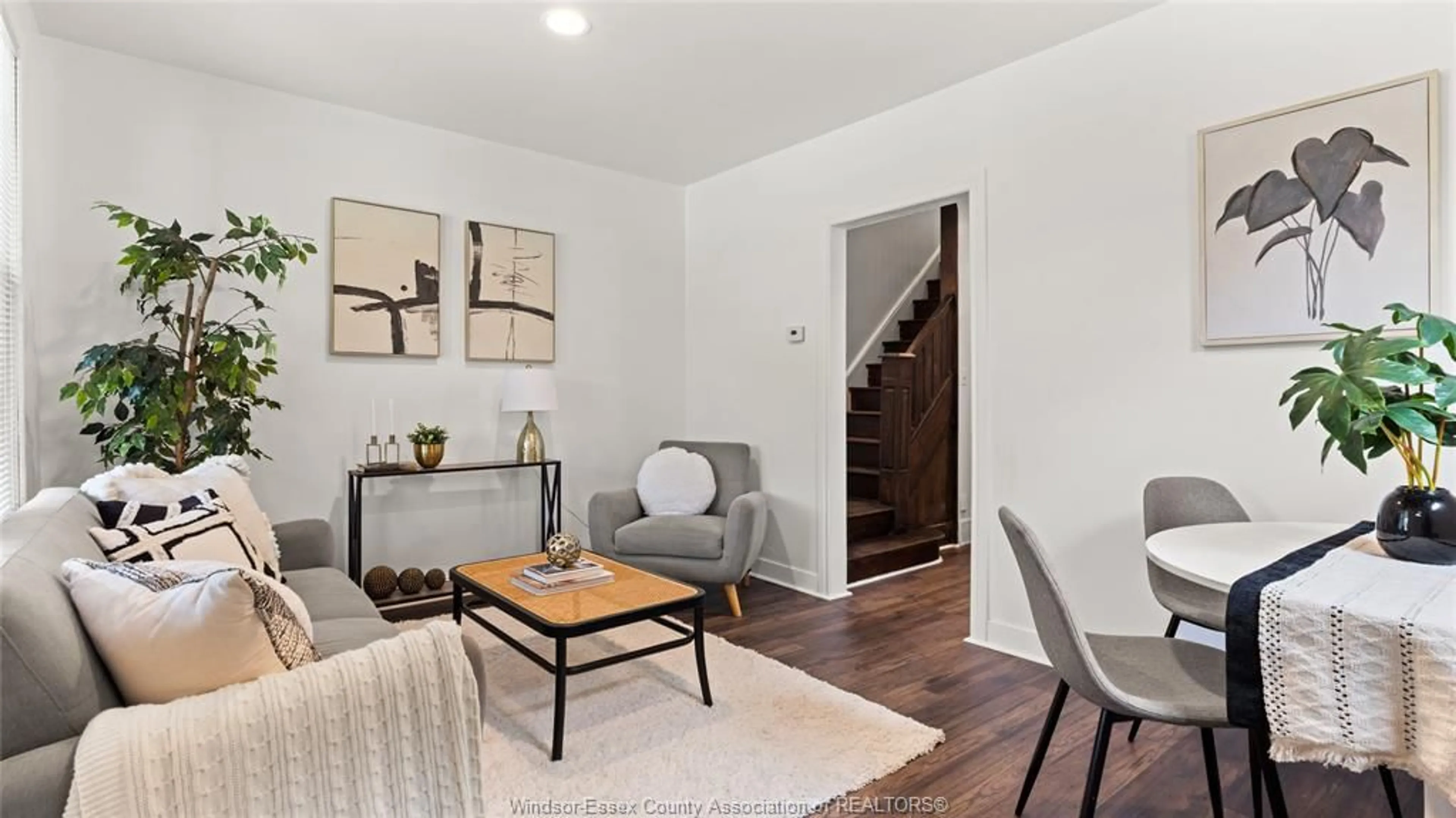 Living room with furniture, wood/laminate floor for 737 Piche, Windsor Ontario N9C 3G6
