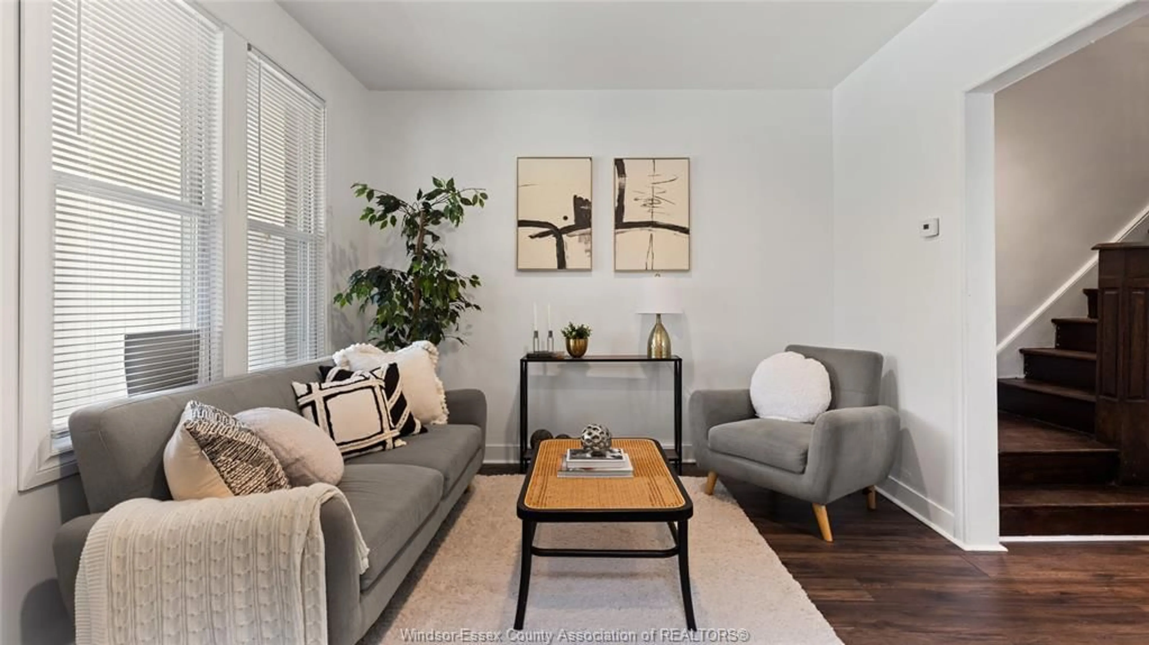 Living room with furniture, wood/laminate floor for 737 Piche, Windsor Ontario N9C 3G6