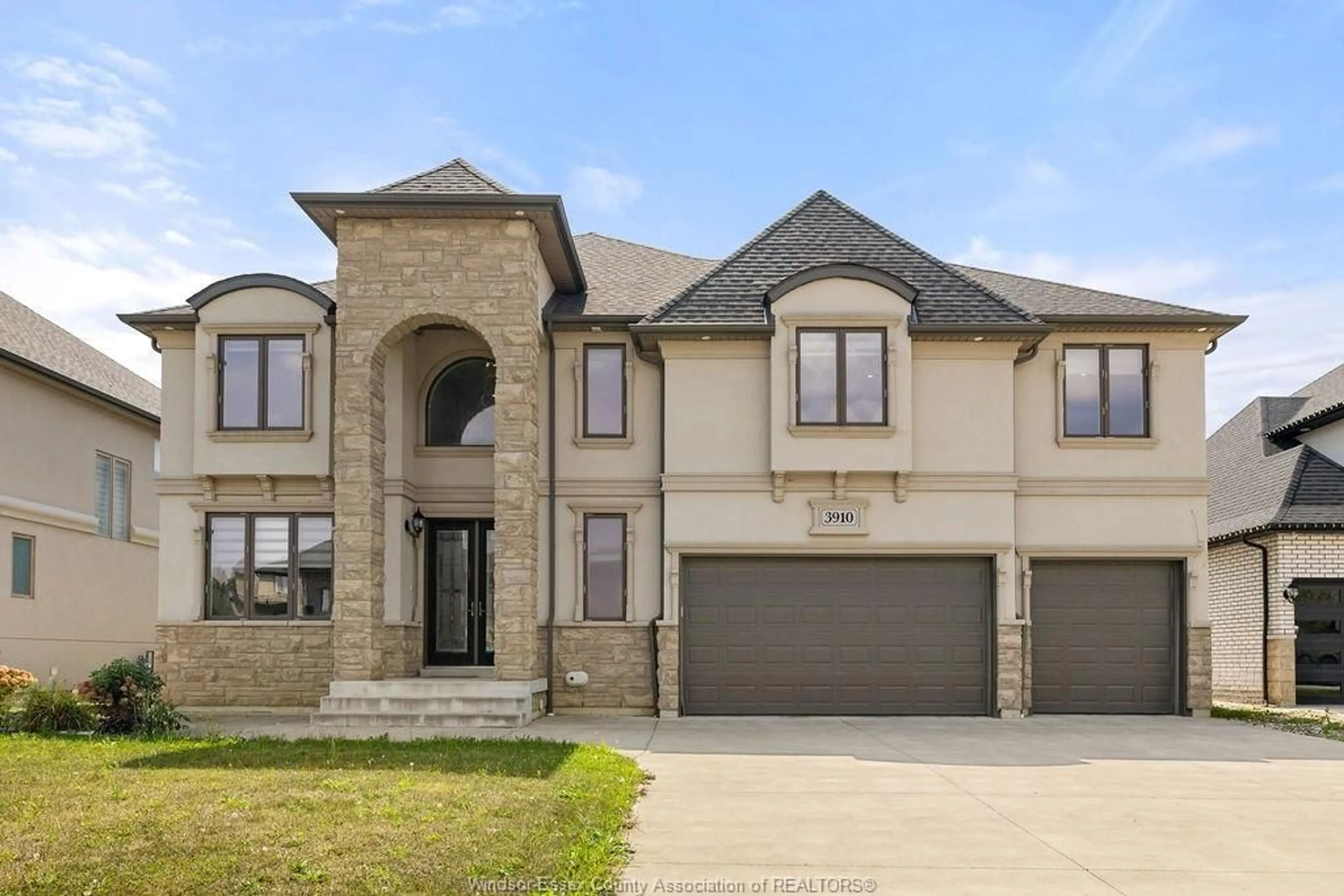 Home with brick exterior material, street for 3910 LASALLE WOODS Blvd, LaSalle Ontario N9H 0G6