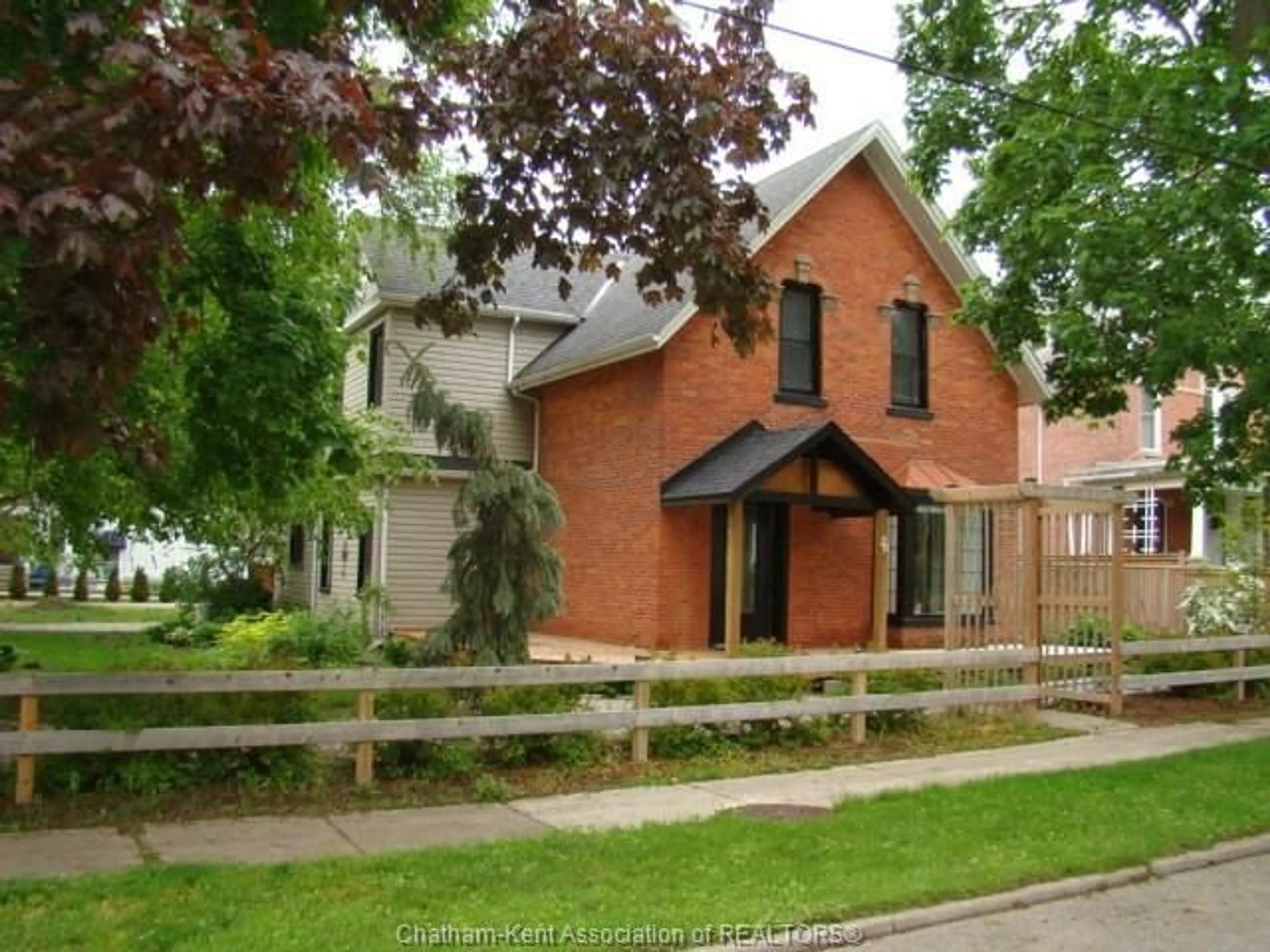 Home with brick exterior material, street for 26 ERIE St, Ridgetown Ontario N0P 2C0