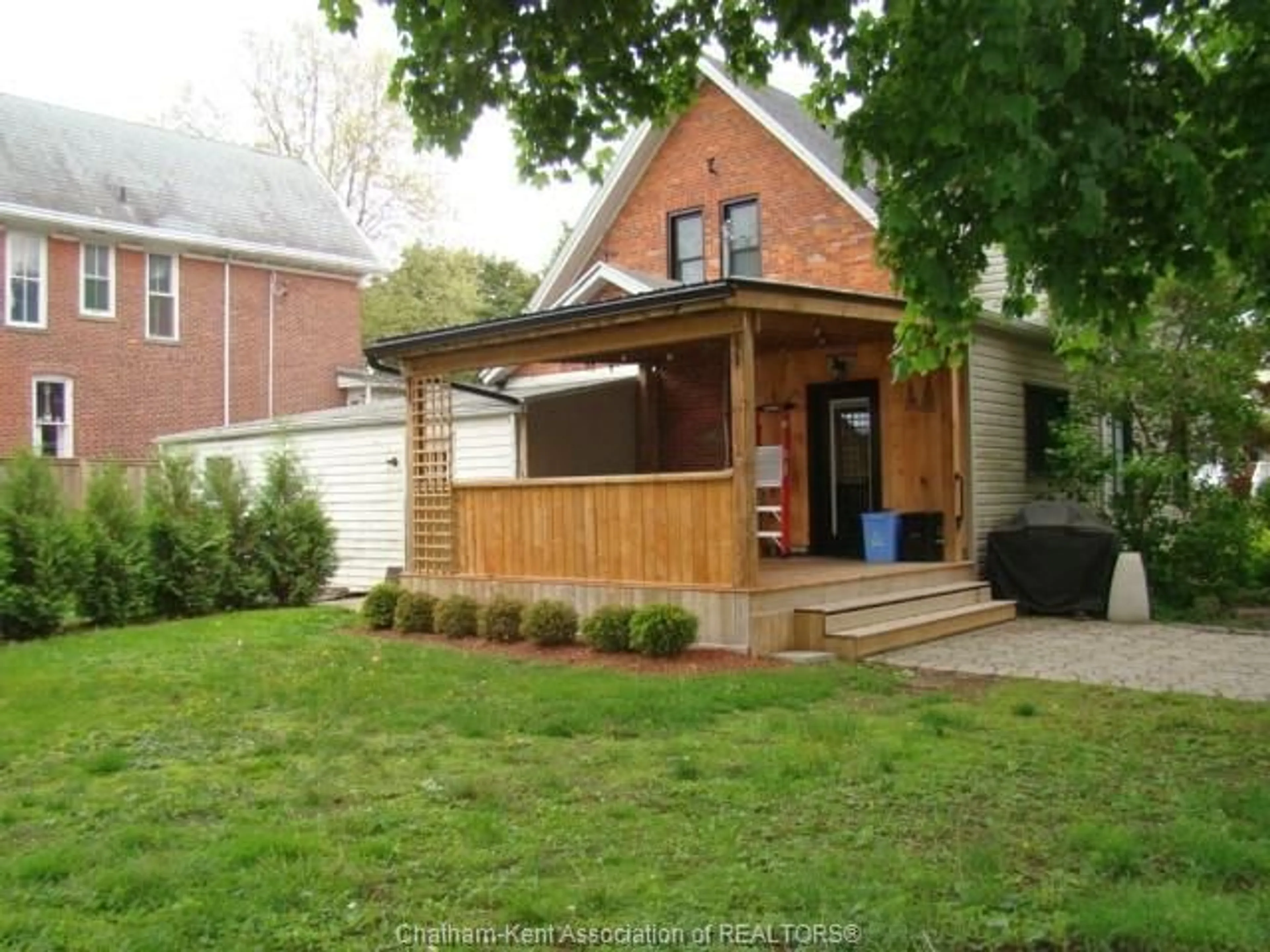 Home with brick exterior material, street for 26 ERIE St, Ridgetown Ontario N0P 2C0