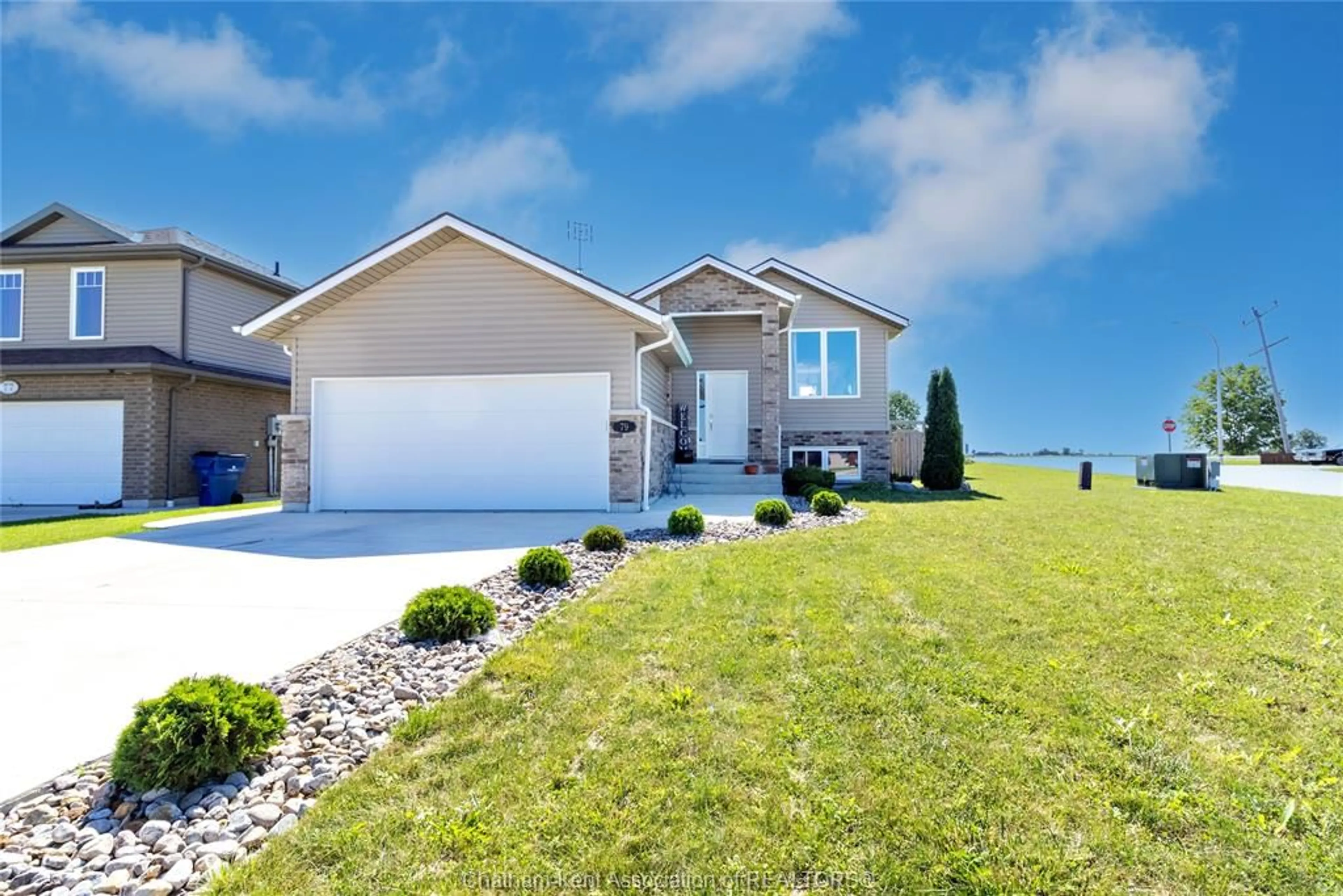 Home with vinyl exterior material, water/lake/river/ocean view for 79 Blackacre Cres, Tilbury Ontario N0P 2L0