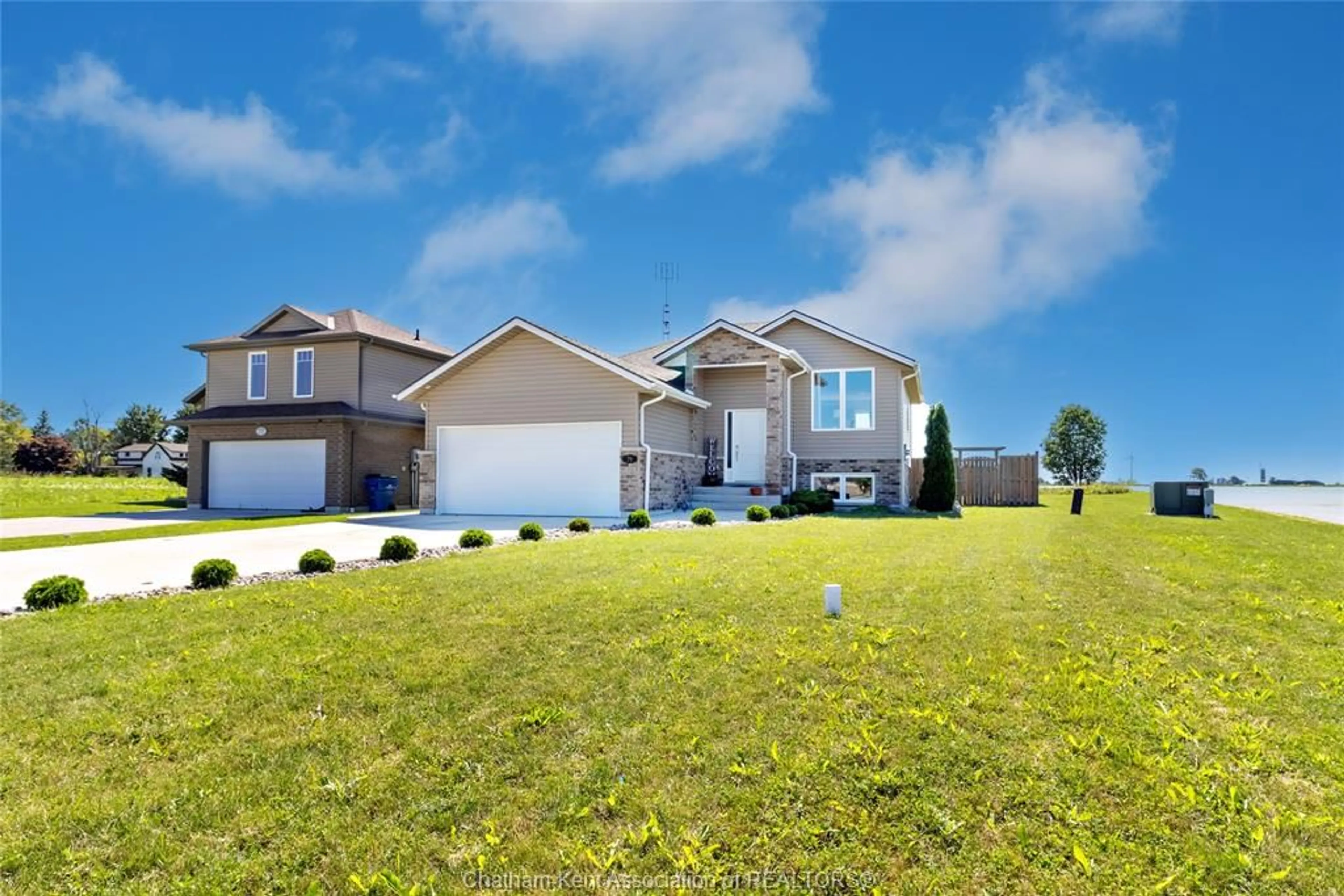 Home with vinyl exterior material, street for 79 Blackacre Cres, Tilbury Ontario N0P 2L0
