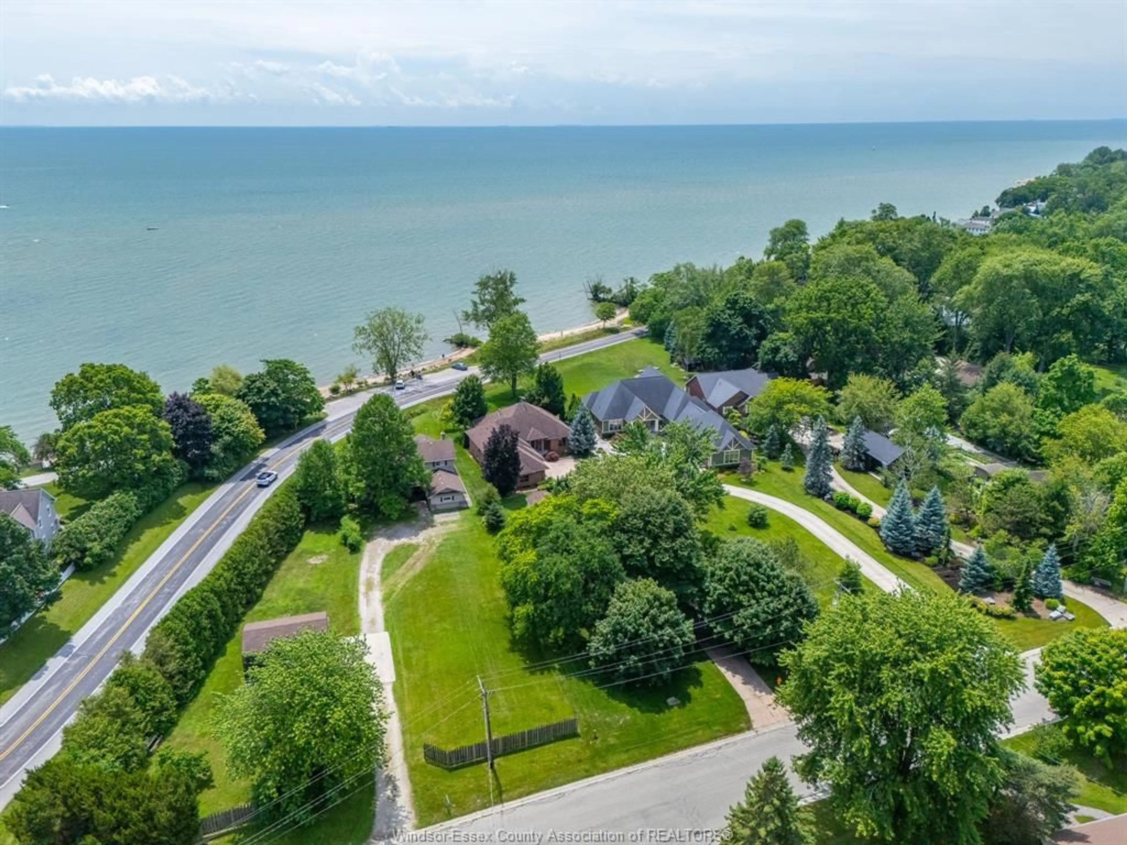 A pic from outside/outdoor area/front of a property/back of a property/a pic from drone, water/lake/river/ocean view for 501 LAKE DRIVE, Kingsville Ontario N9Y 3S6