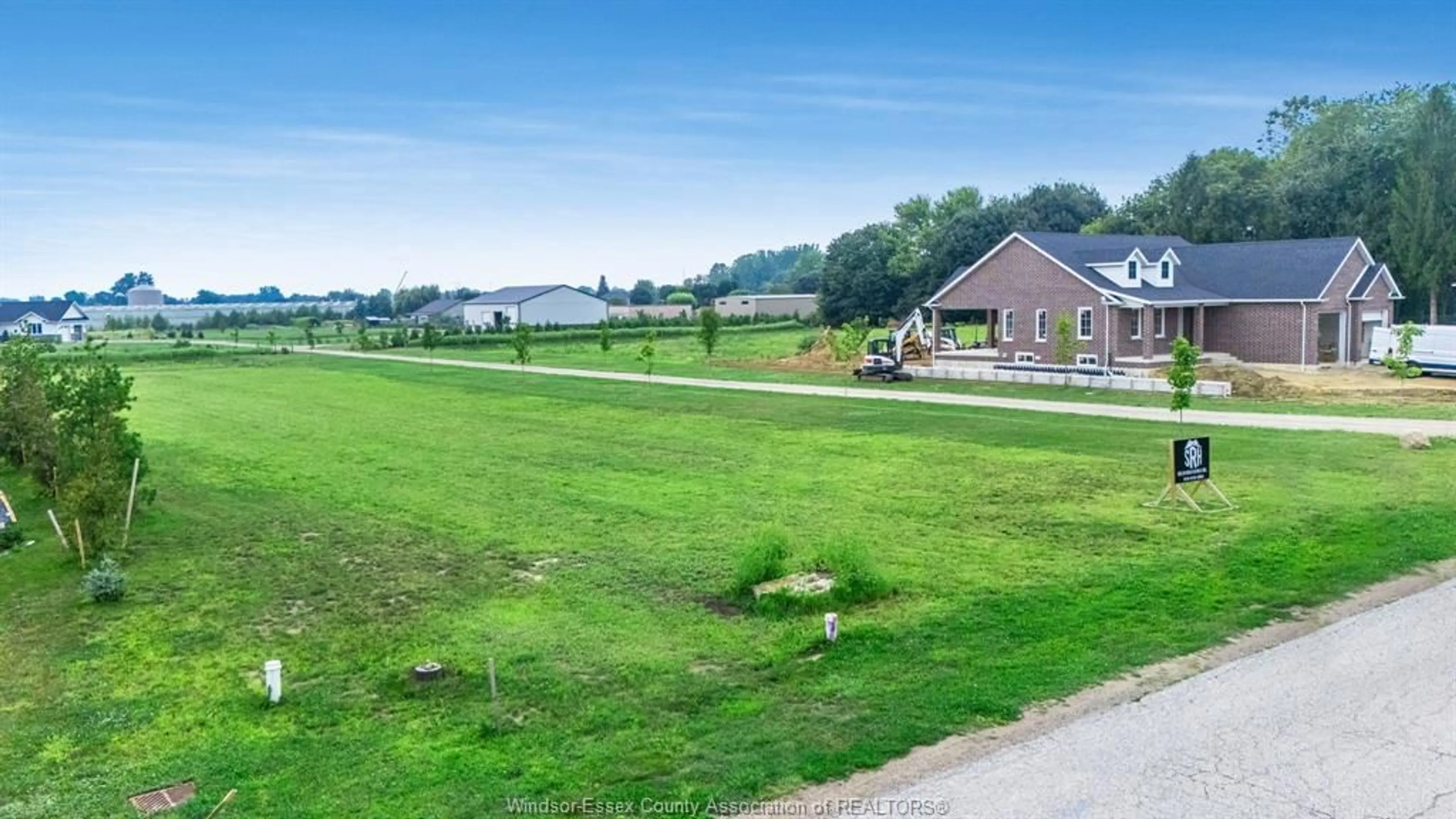 A pic from outside/outdoor area/front of a property/back of a property/a pic from drone, water/lake/river/ocean view for 1647 Road 2, Kingsville Ontario N0P 2G0