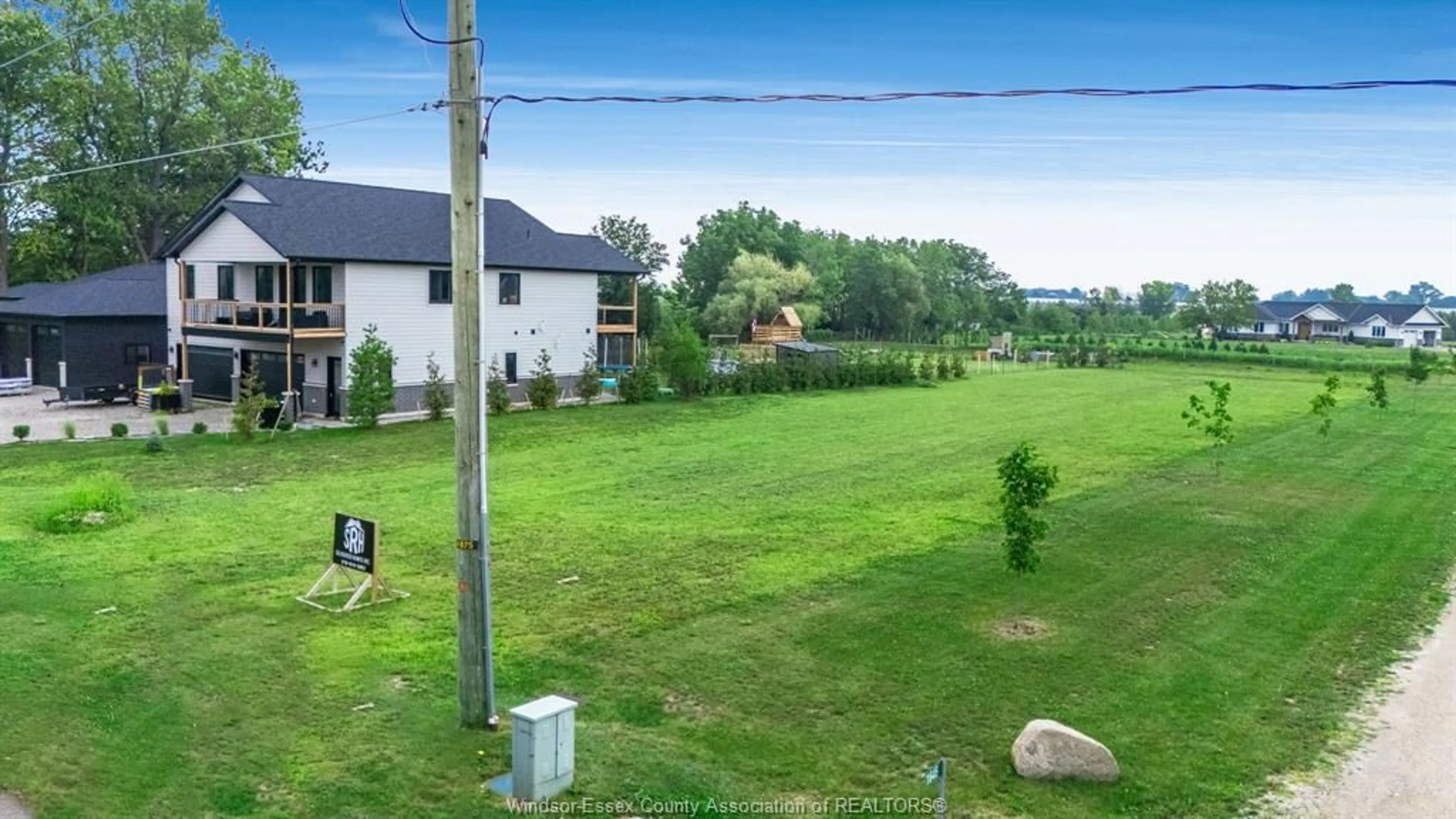 A pic from outside/outdoor area/front of a property/back of a property/a pic from drone, water/lake/river/ocean view for 1647 Road 2, Kingsville Ontario N0P 2G0