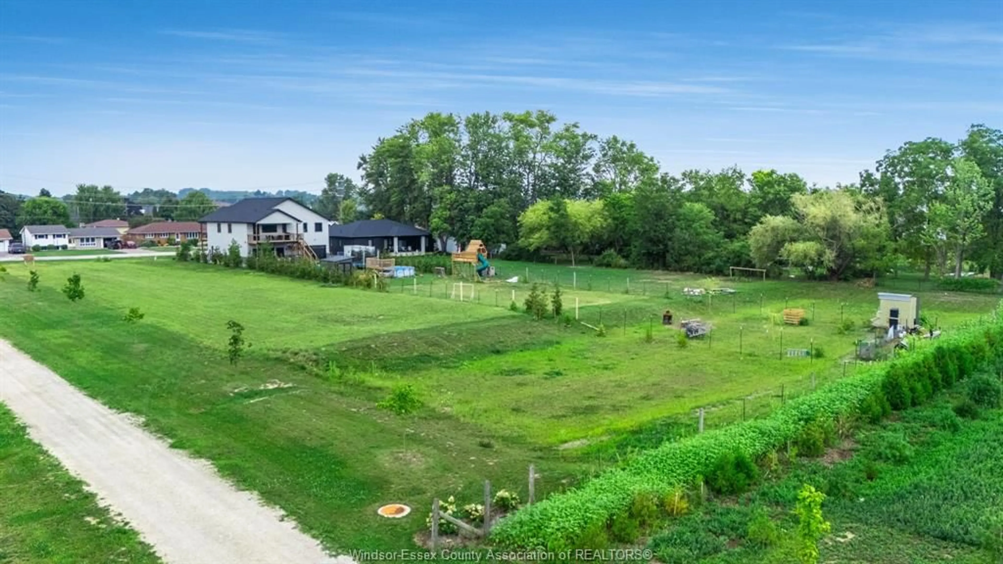 A pic from outside/outdoor area/front of a property/back of a property/a pic from drone, water/lake/river/ocean view for 1647 Road 2, Kingsville Ontario N0P 2G0
