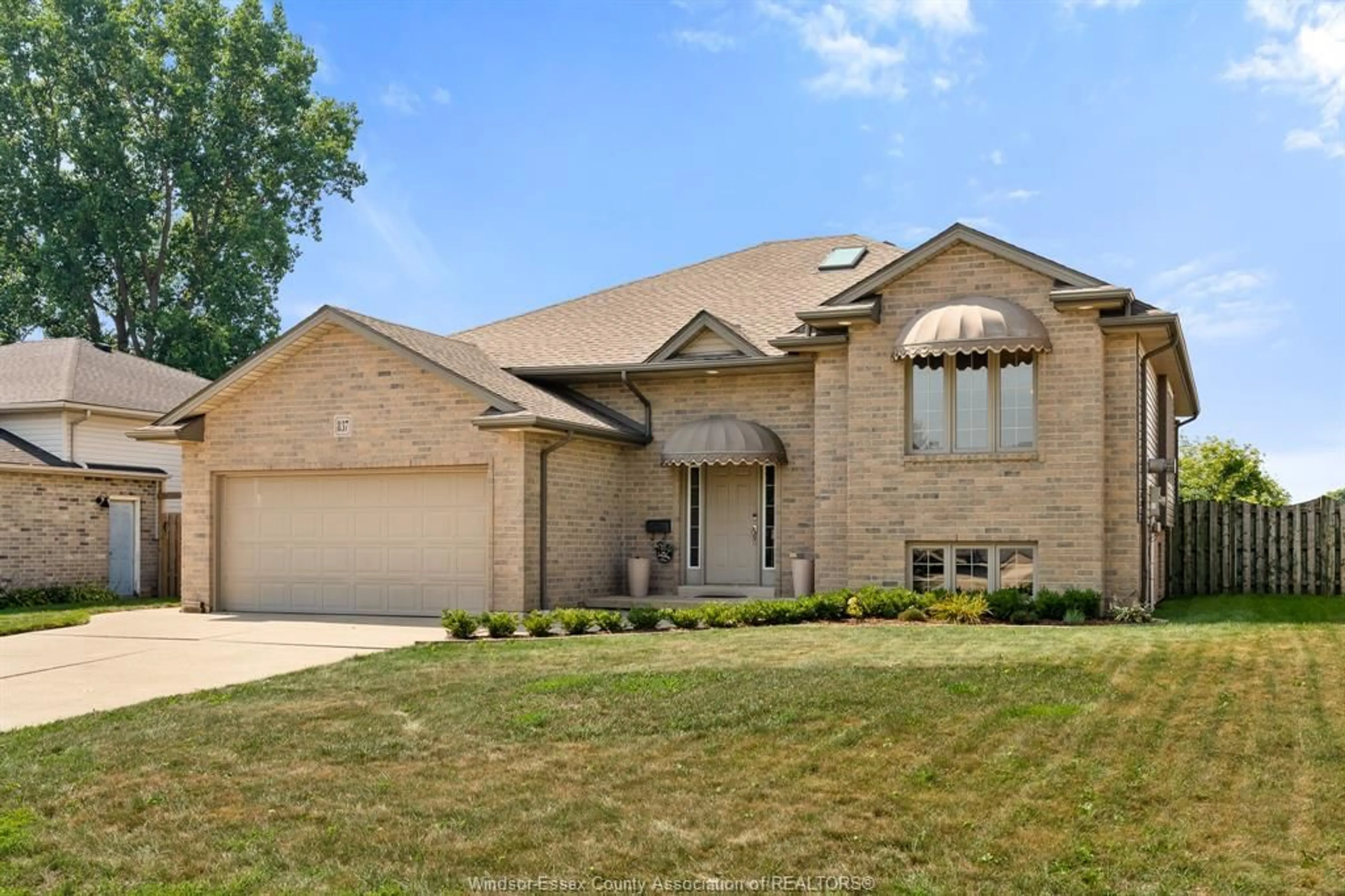 Home with brick exterior material, street for 837 Cottage Grove, Kingsville Ontario N9Y 3G3